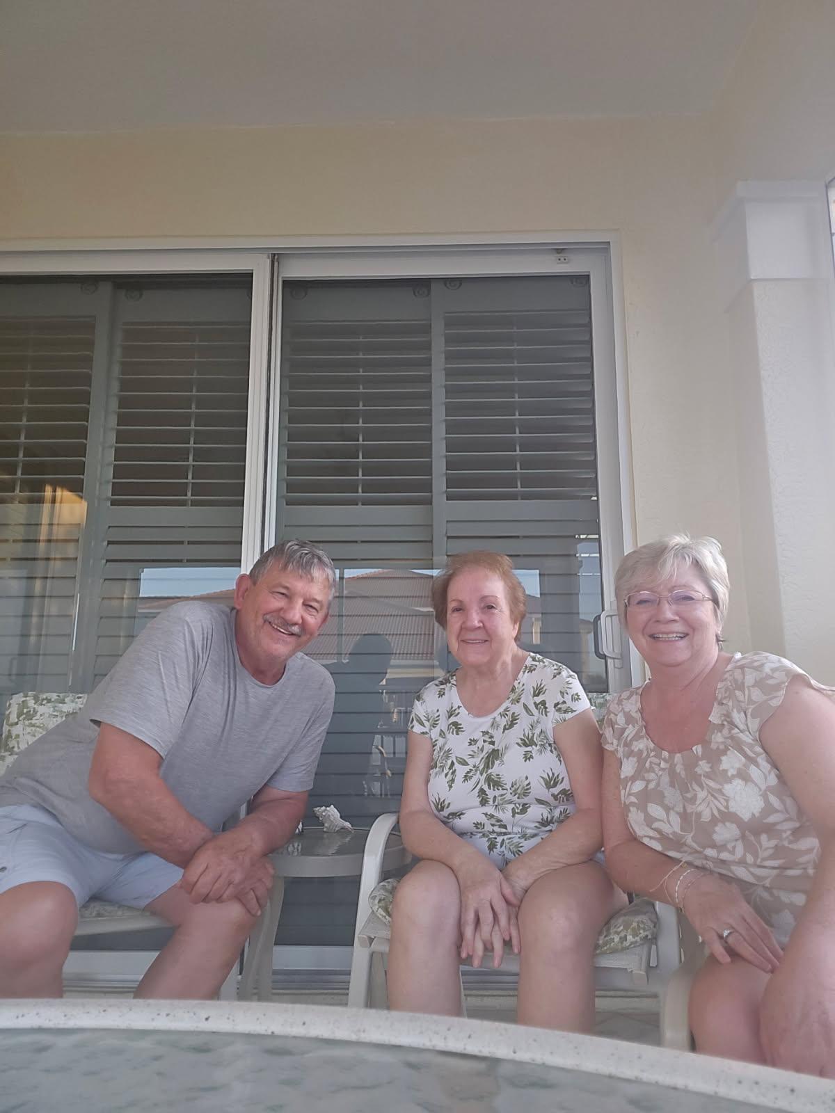 A group of people sitting on chairs