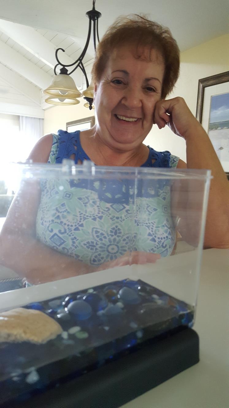 A woman smiling at the camera