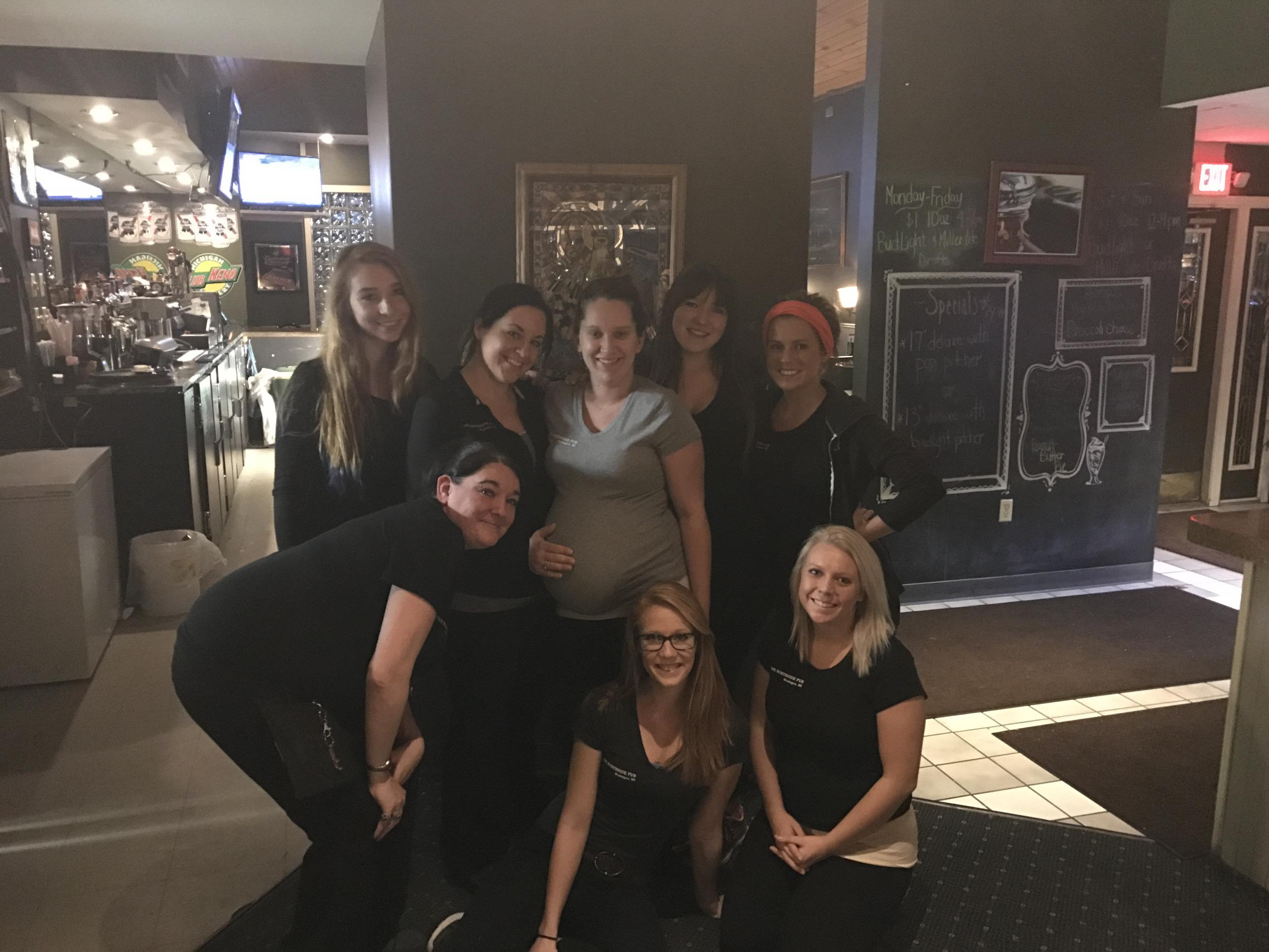 A group of women posing for a photo