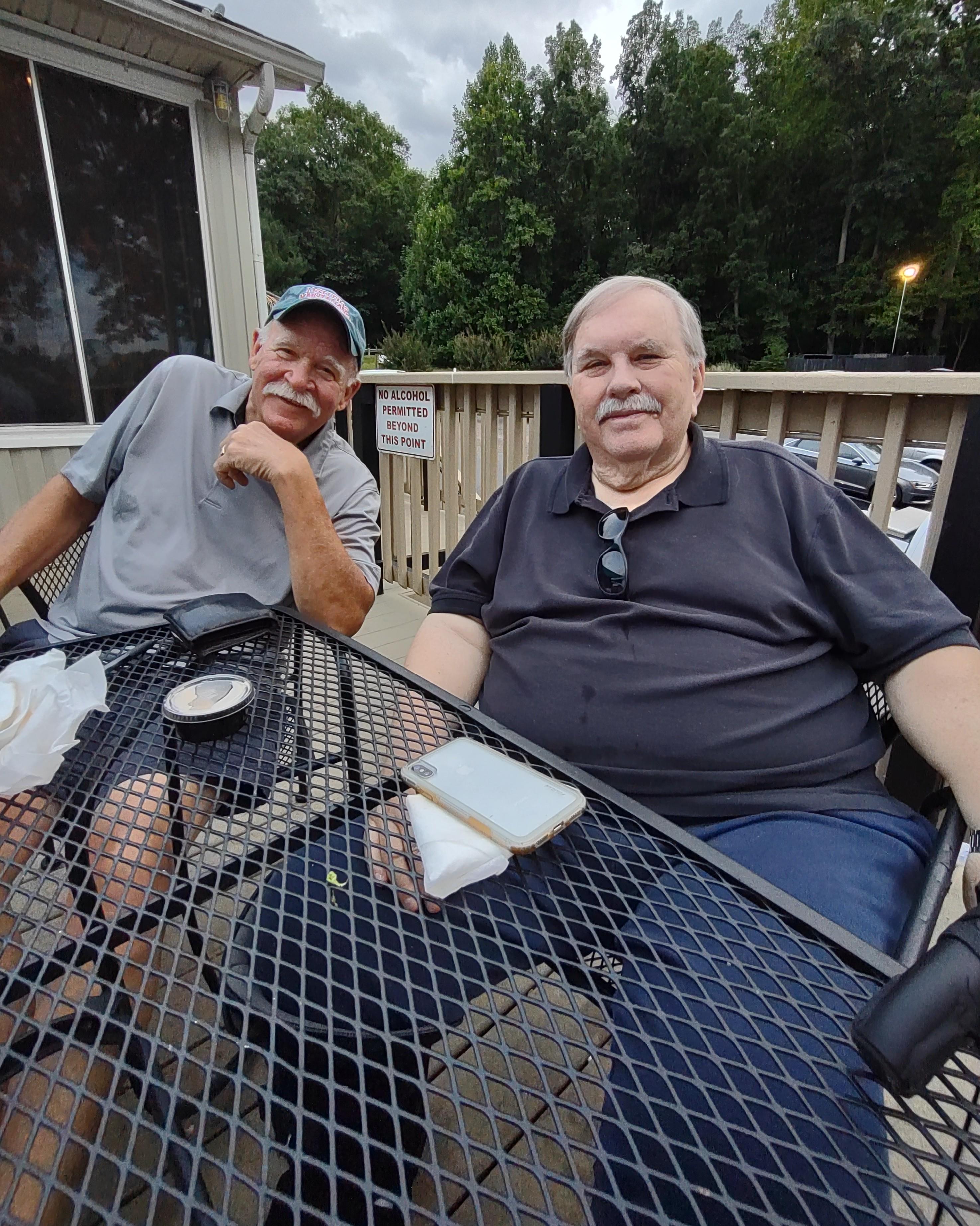 Two men sitting at a table