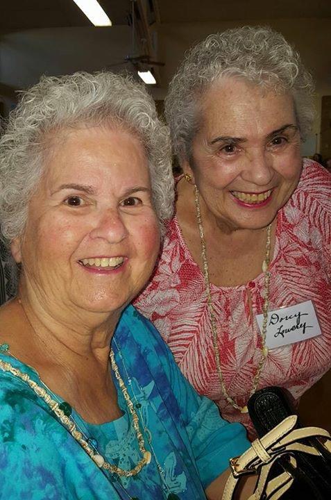 Two women smiling at the camera