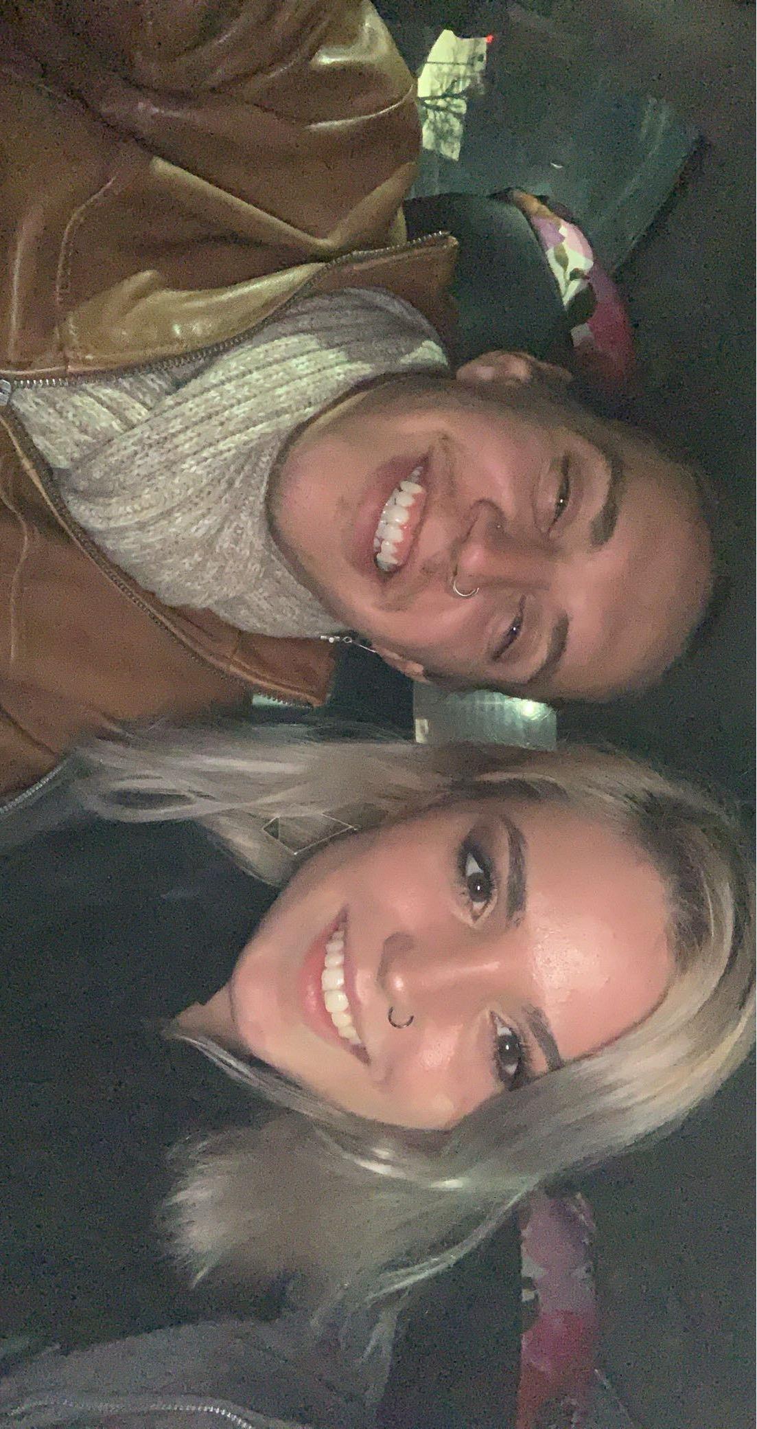A man and woman taking a selfie