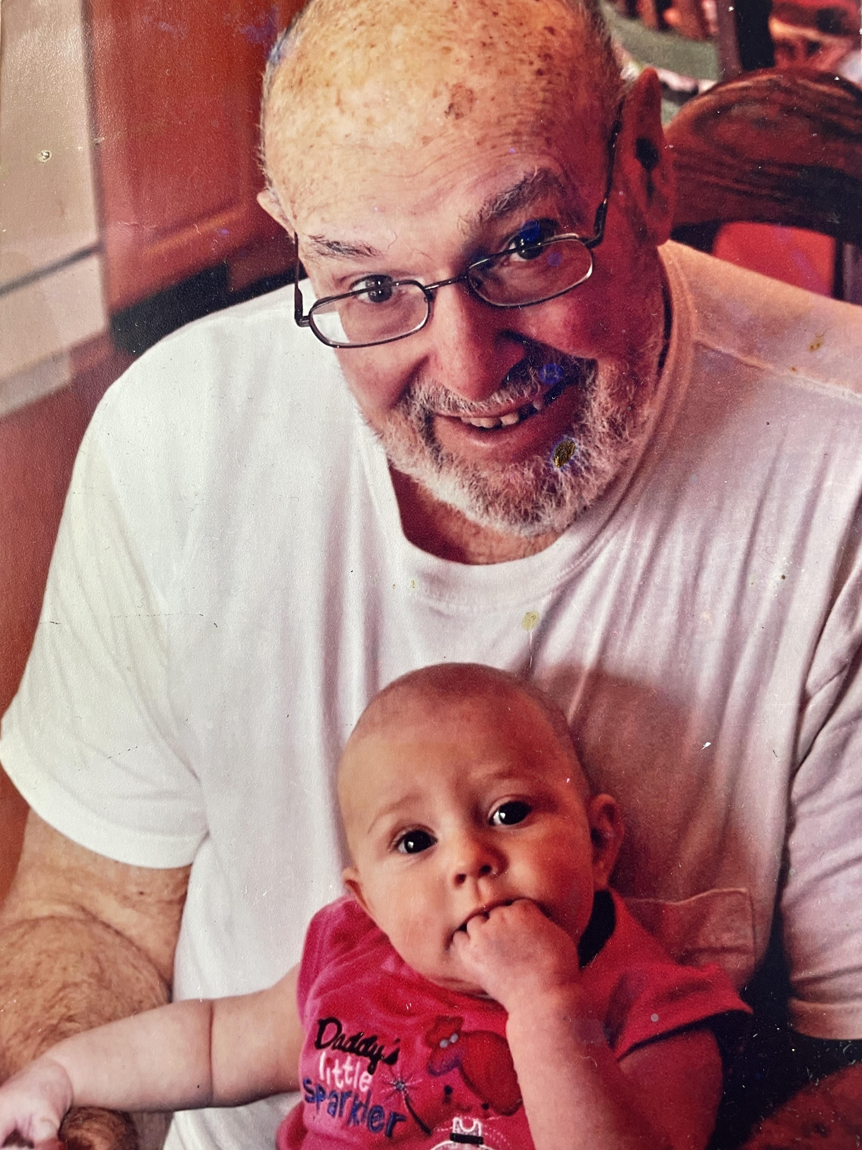 A man holding a baby