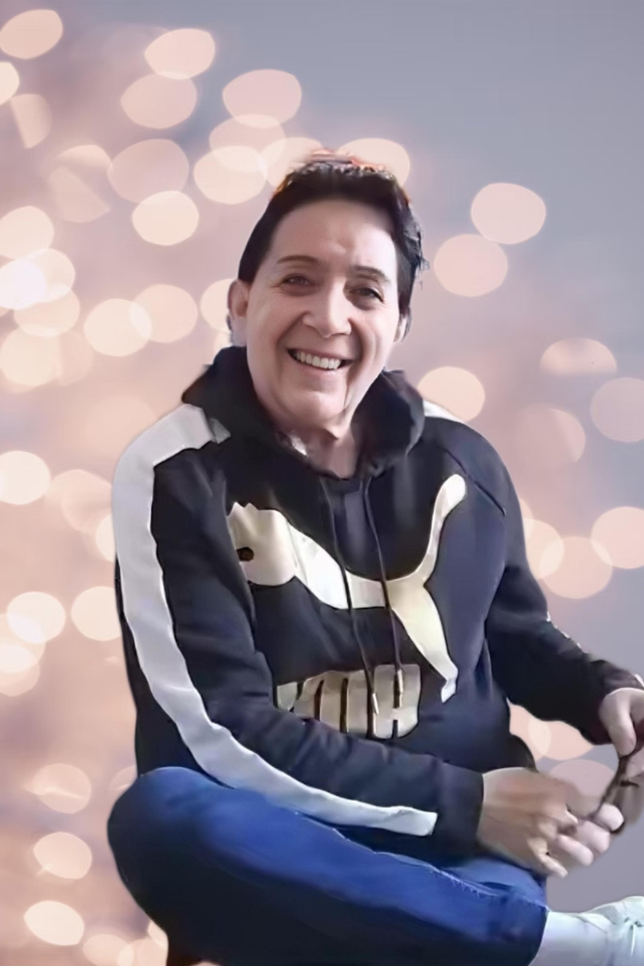 A man smiling at the camera