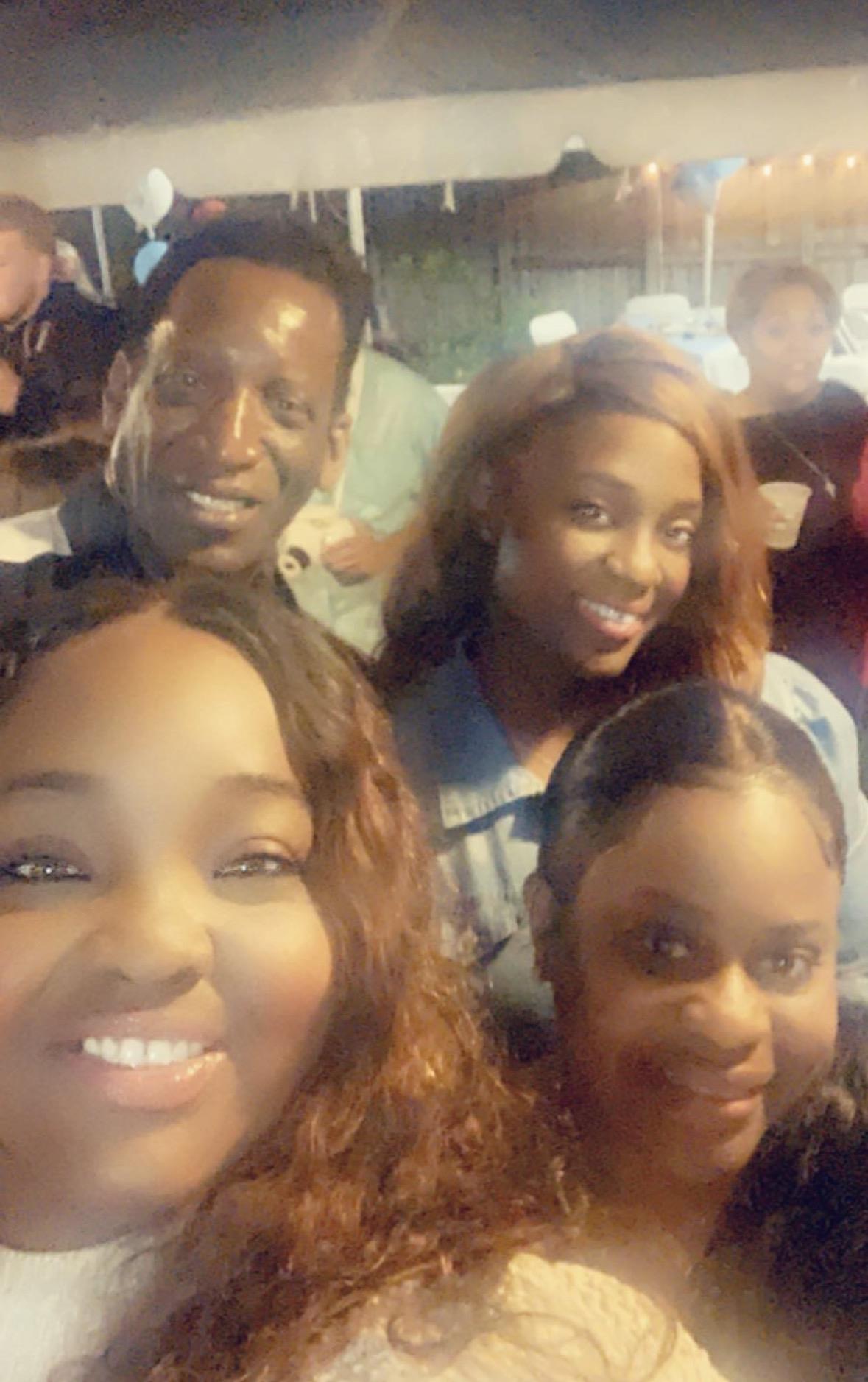 A group of people taking a selfie