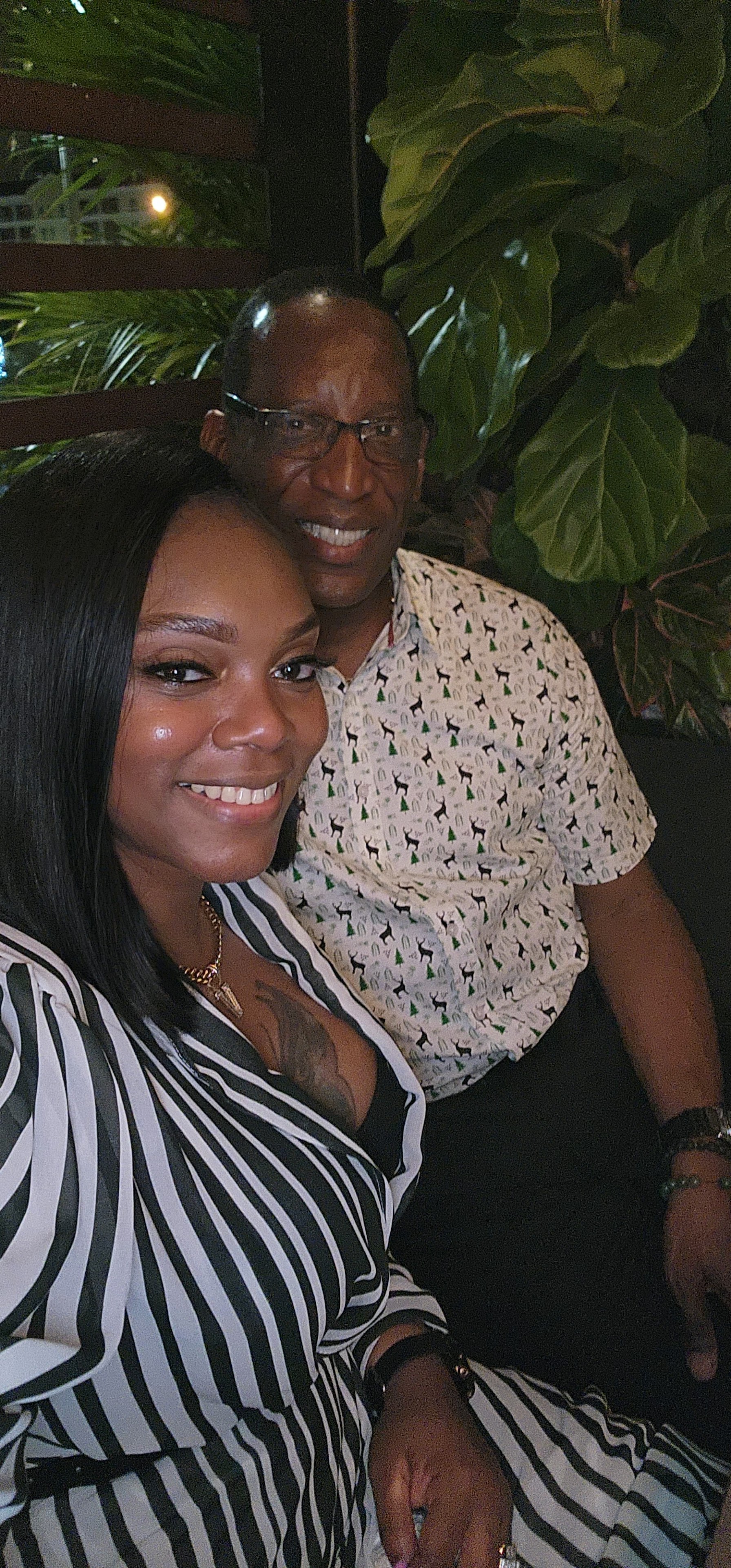 A man and woman taking a selfie