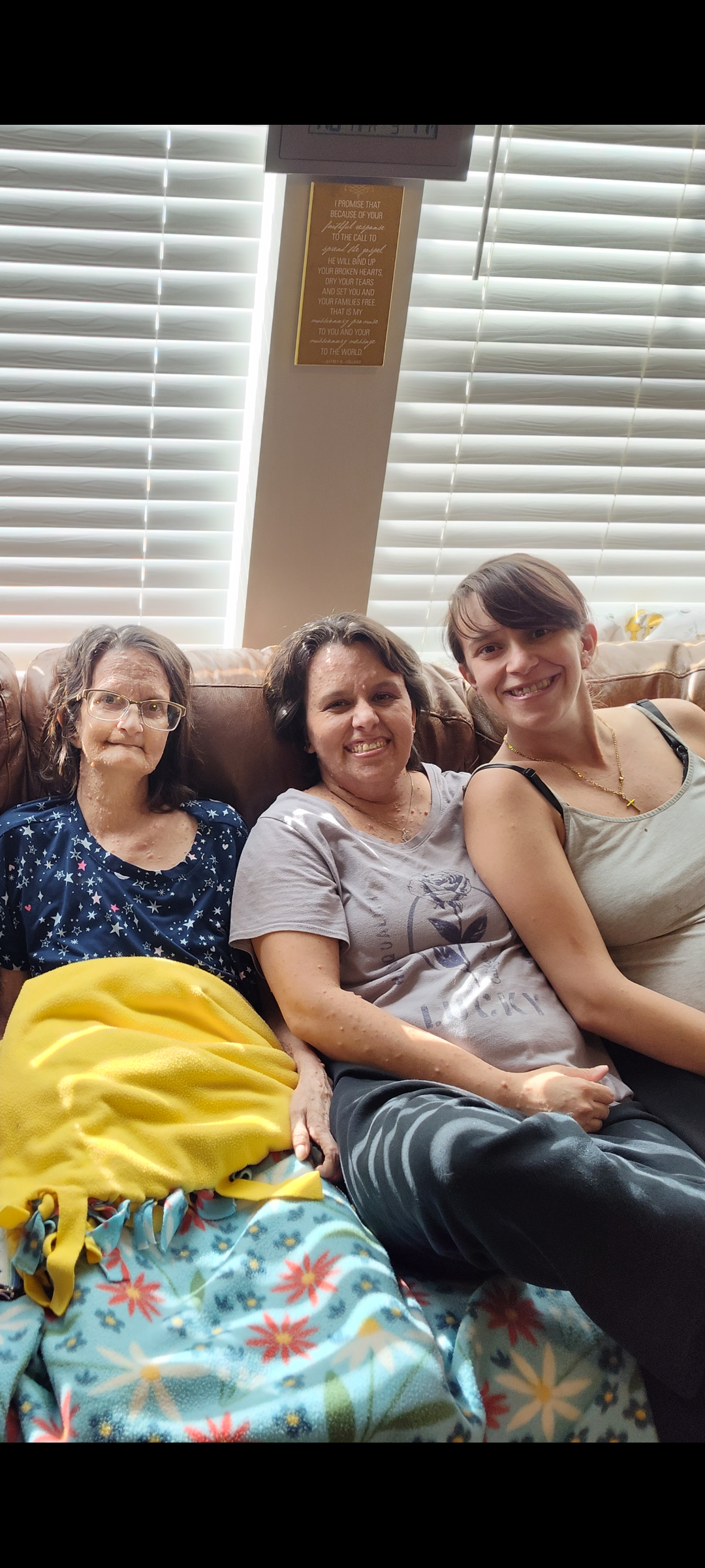 A group of women sitting on a couch