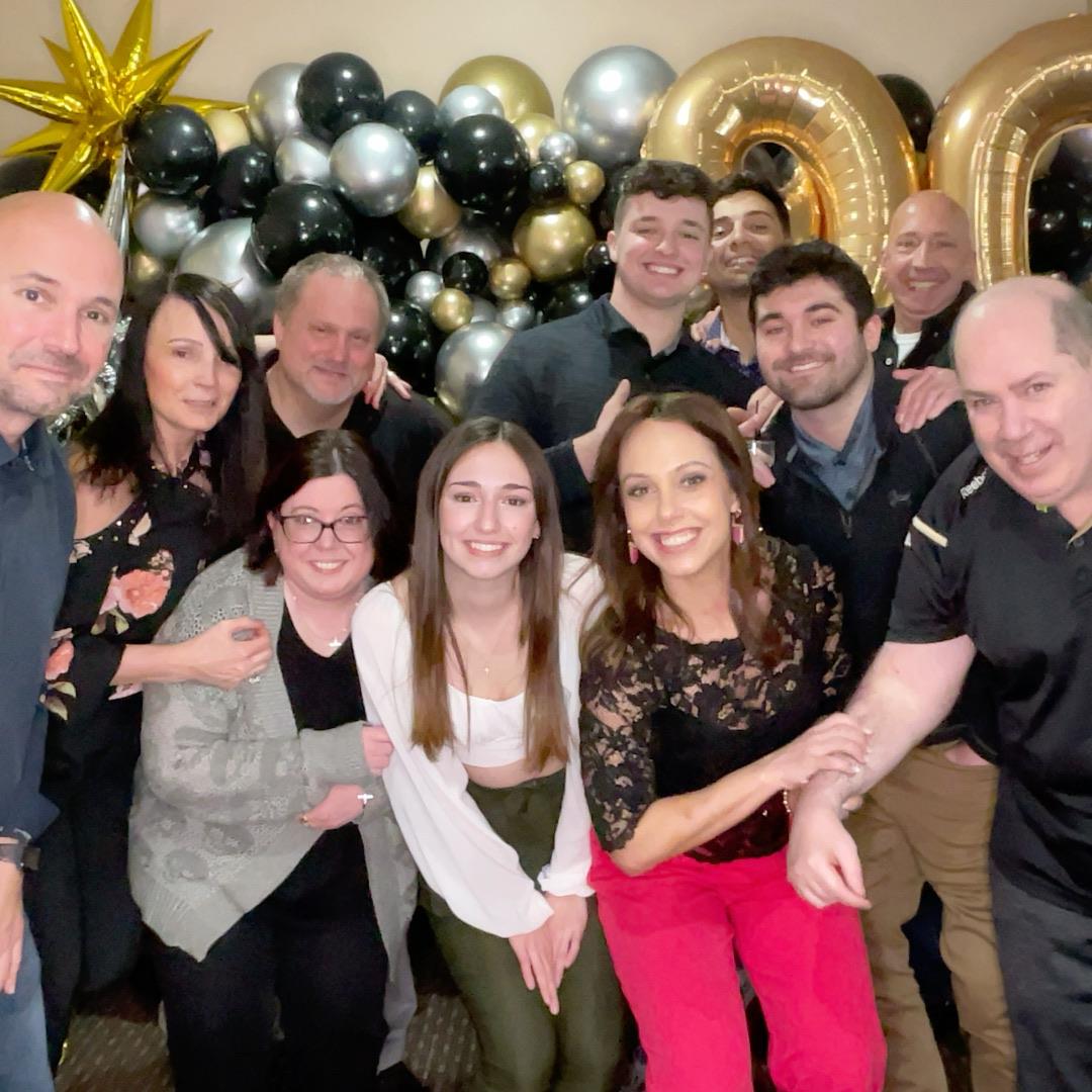 A group of people posing for a photo