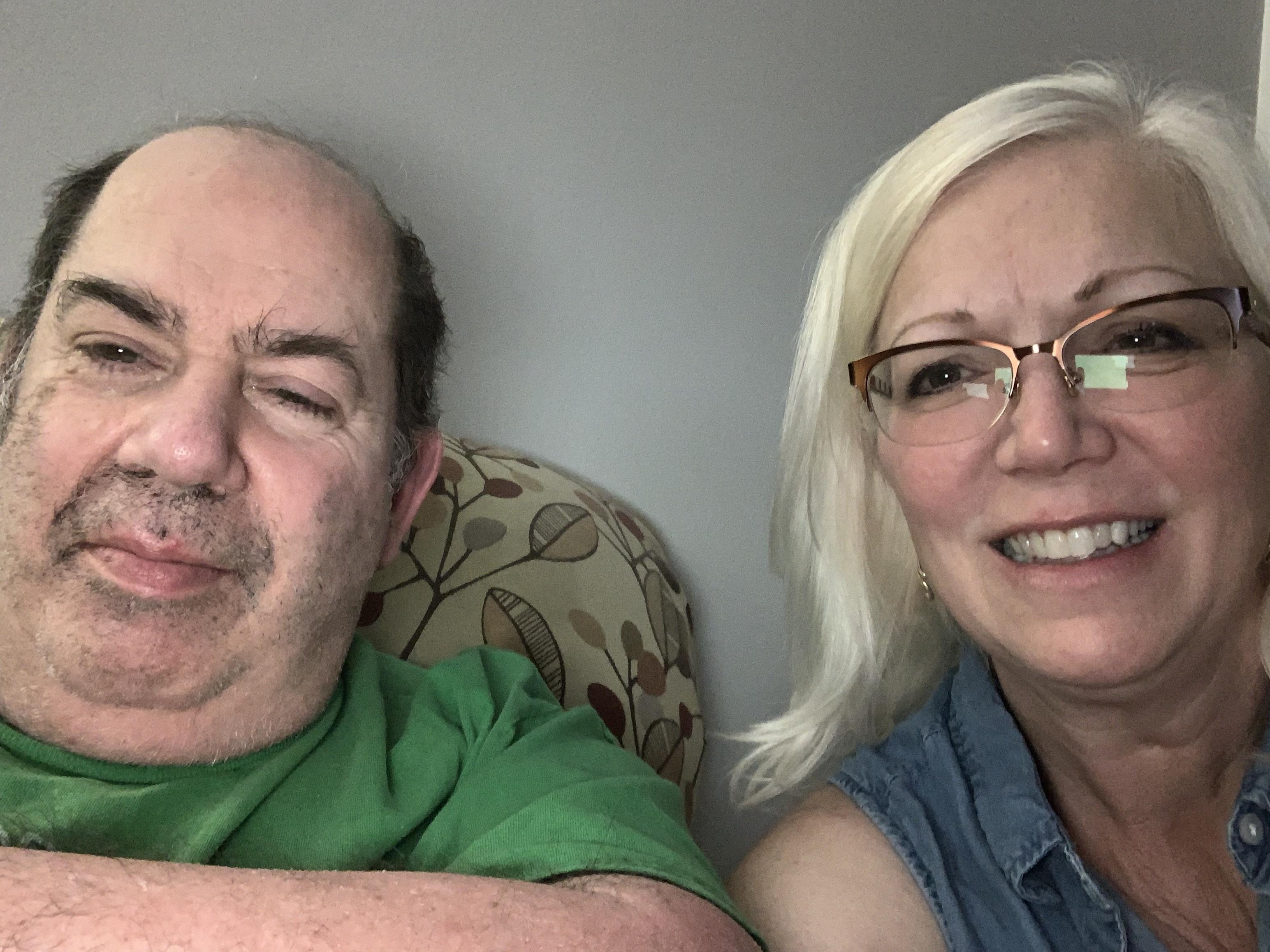 A man and woman taking a selfie