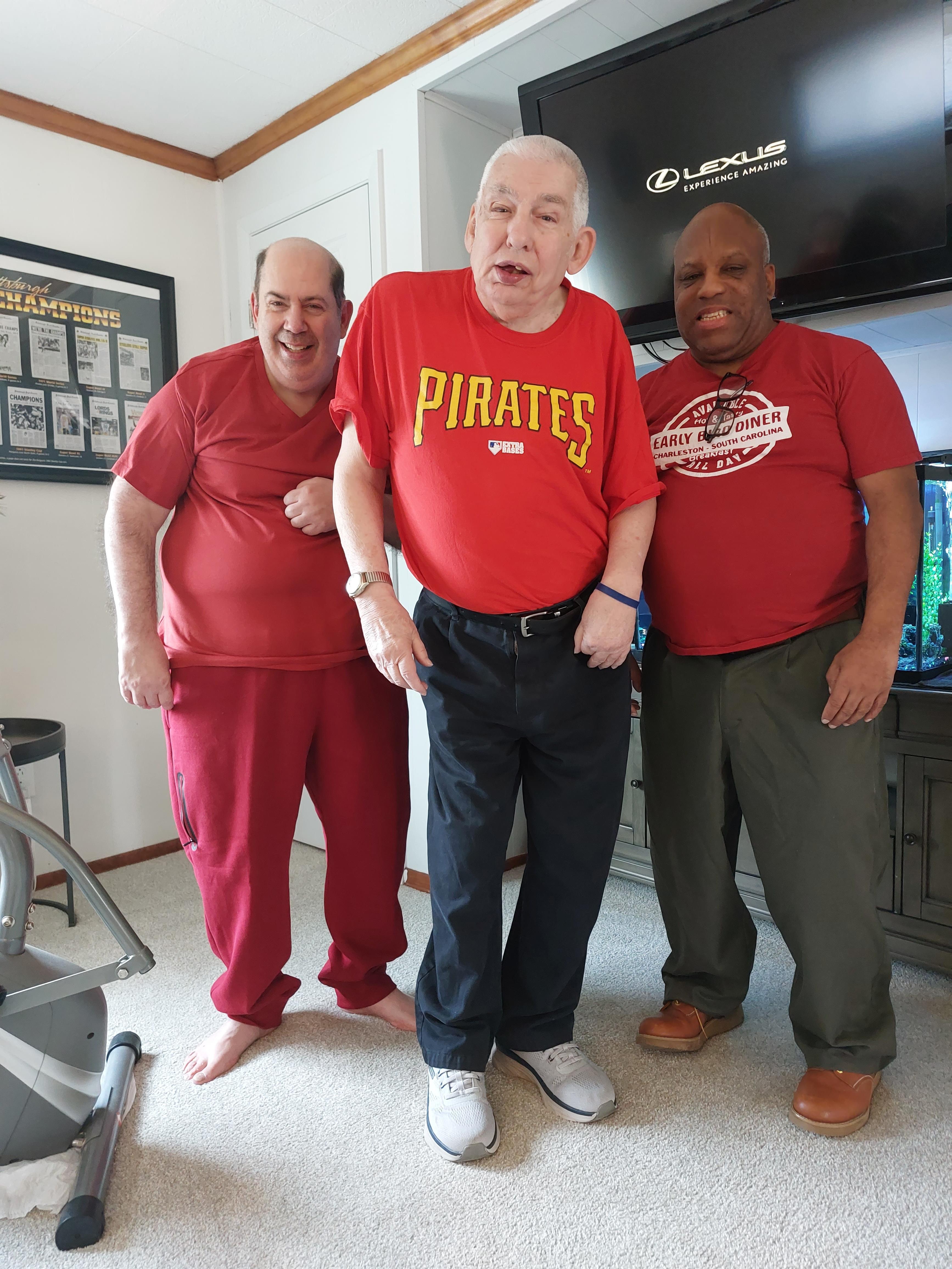 A group of men posing for a picture