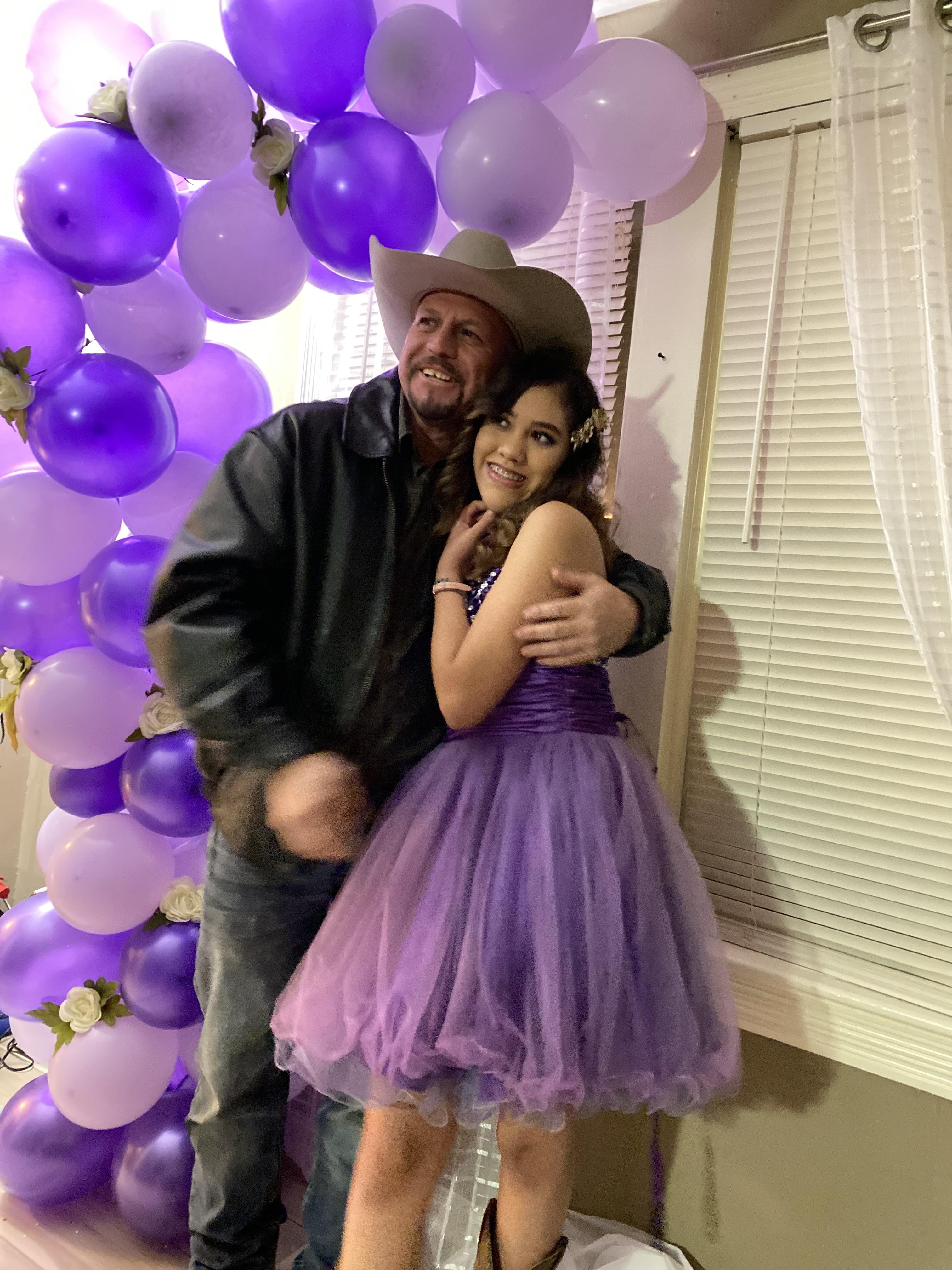 A man and woman posing for a picture
