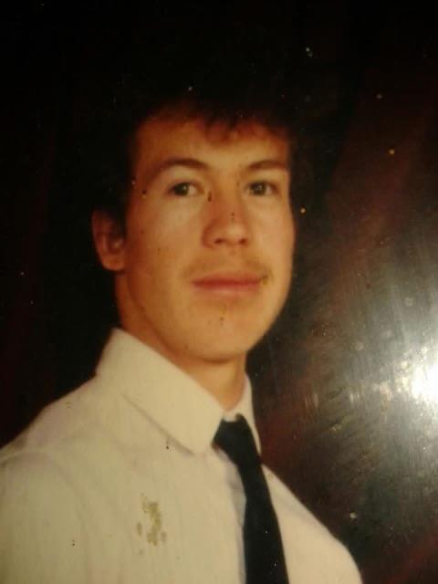 A man in a white shirt and tie