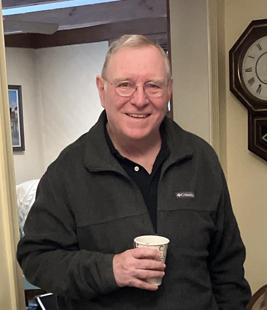A man holding a cup