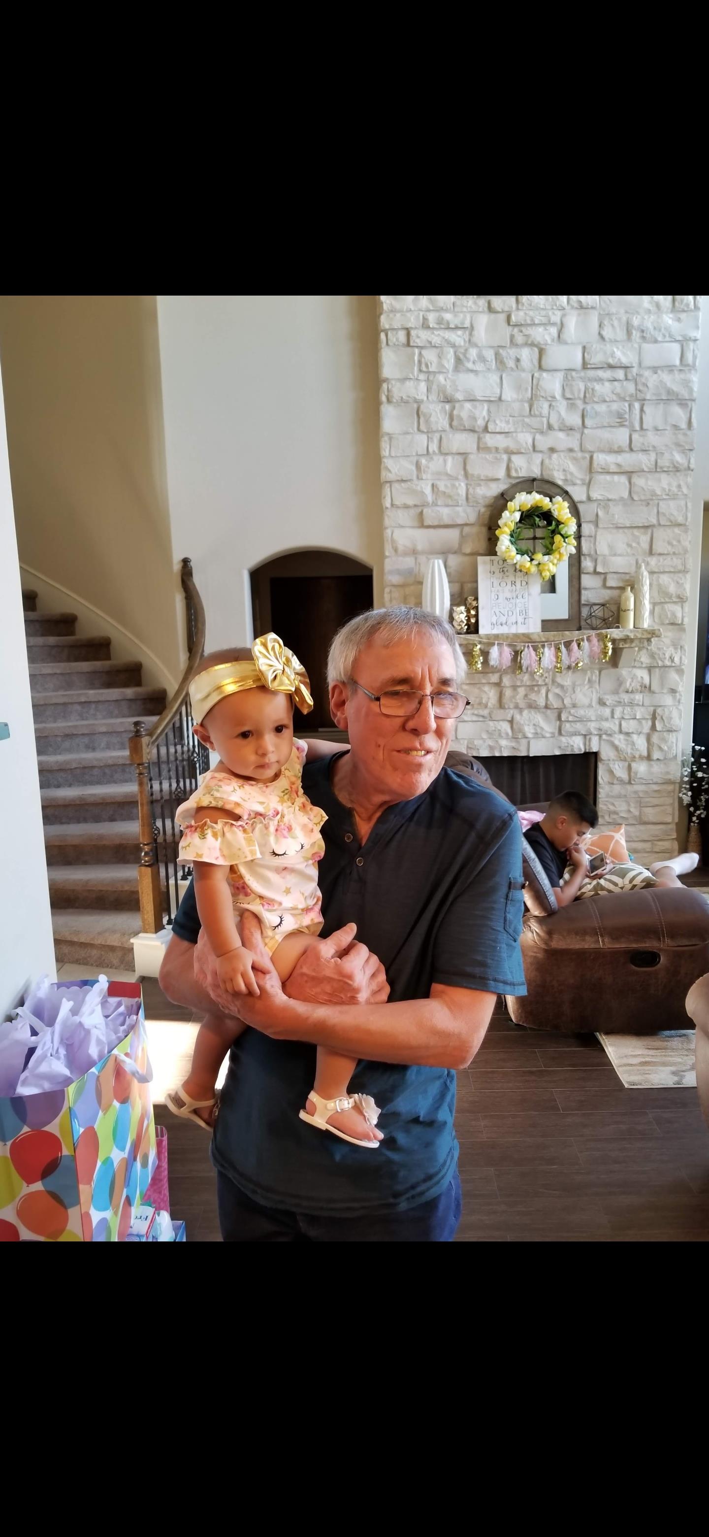 A man holding a baby