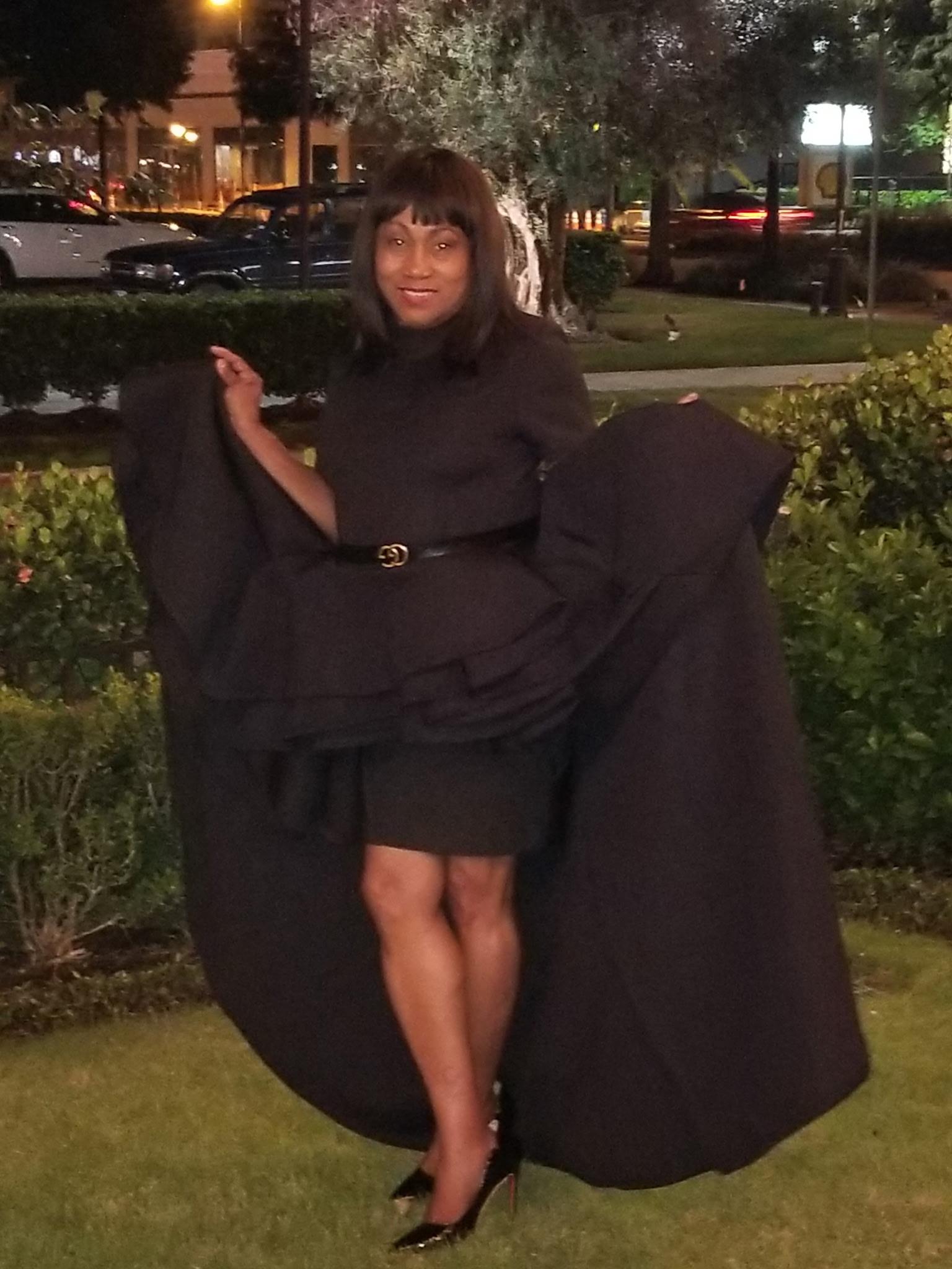 A woman in a black dress