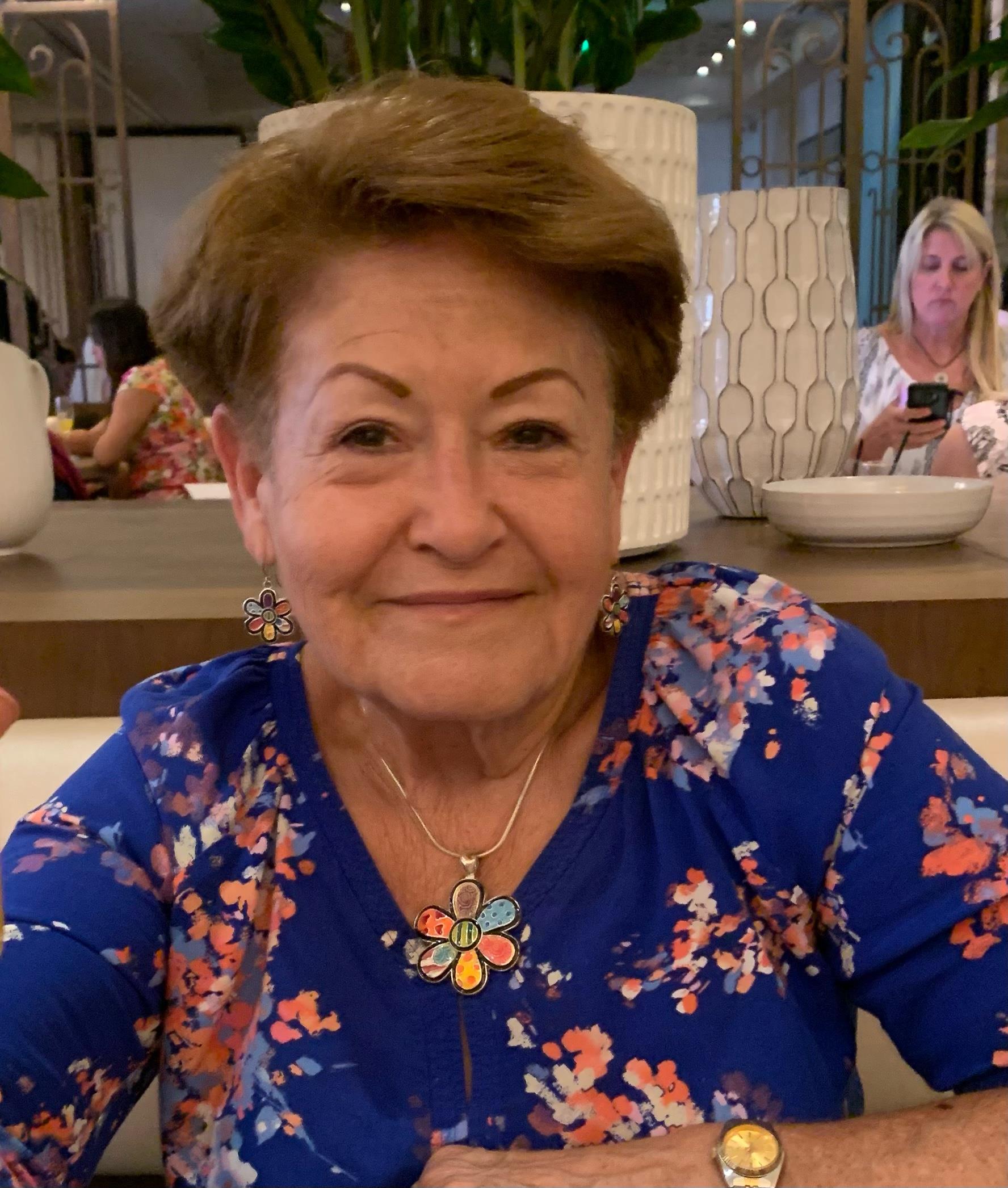 A woman smiling at camera