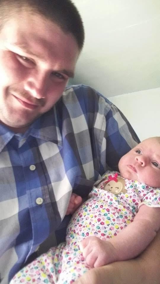 A man holding a baby