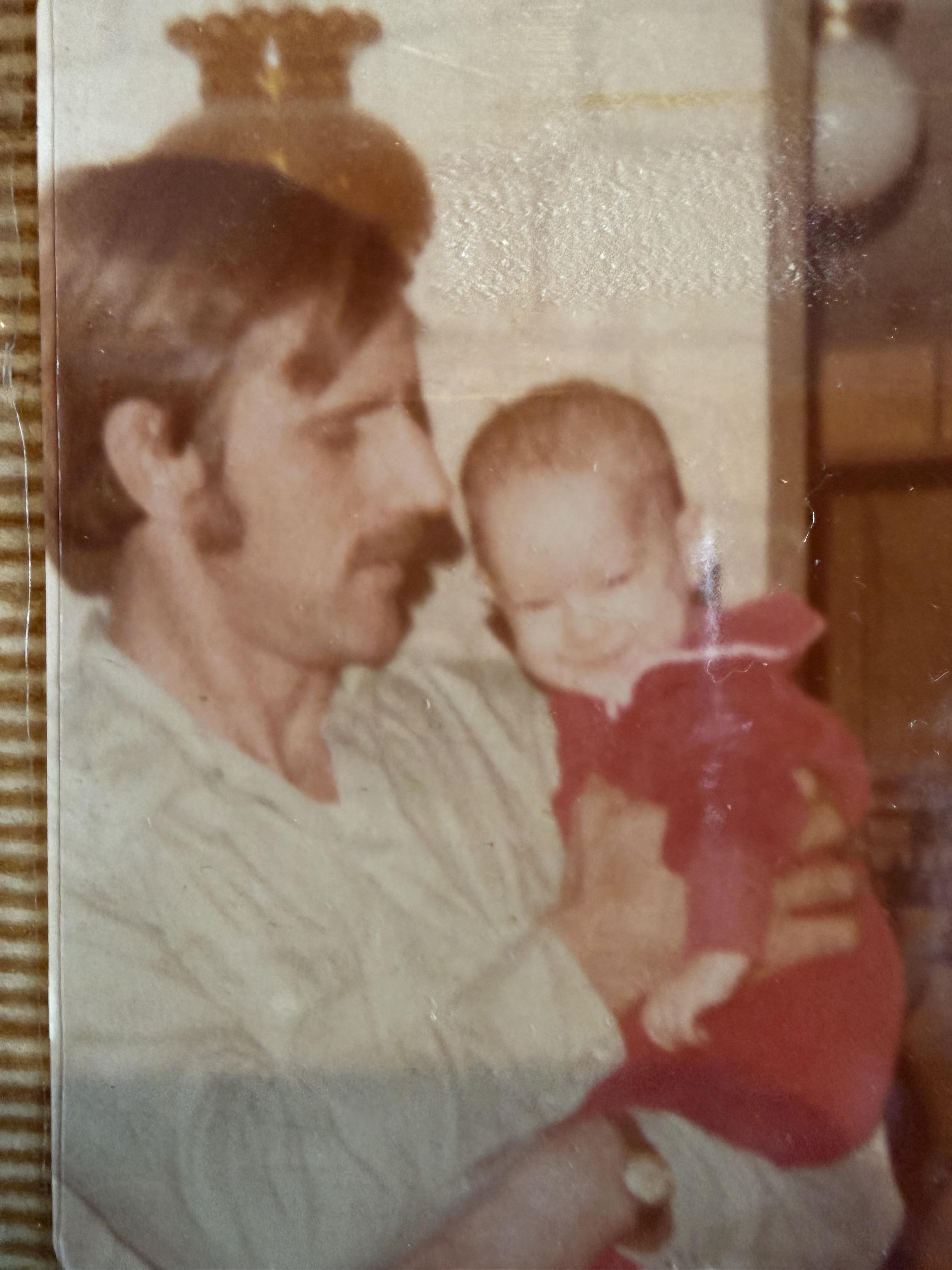 A man holding a baby