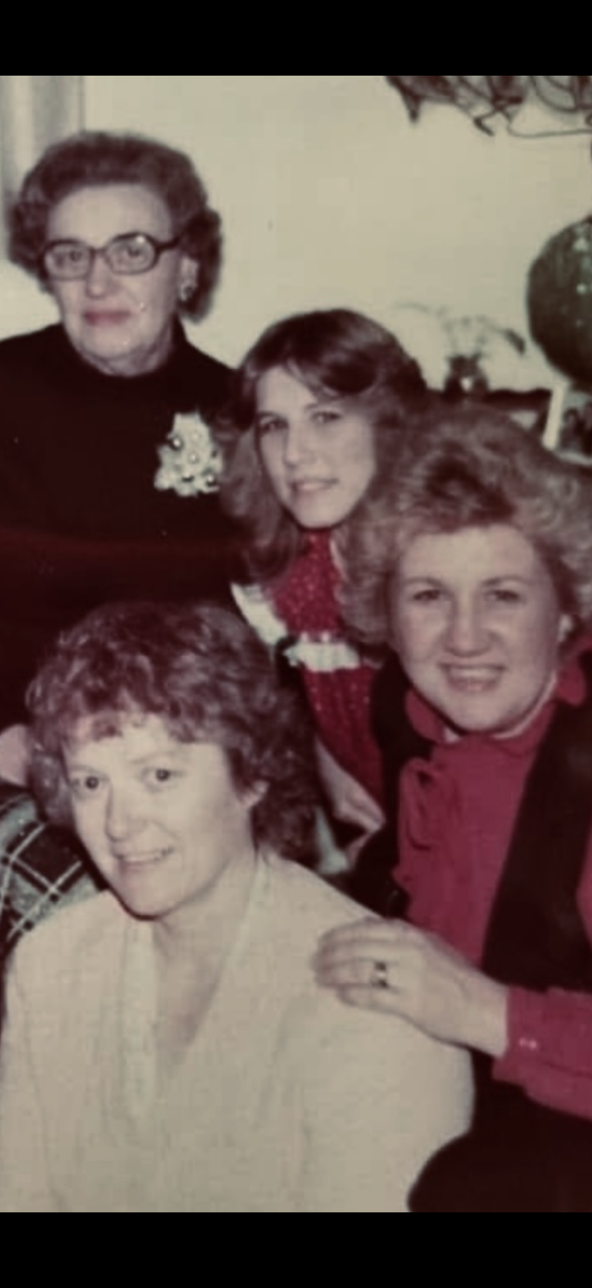 A group of women posing for a photo