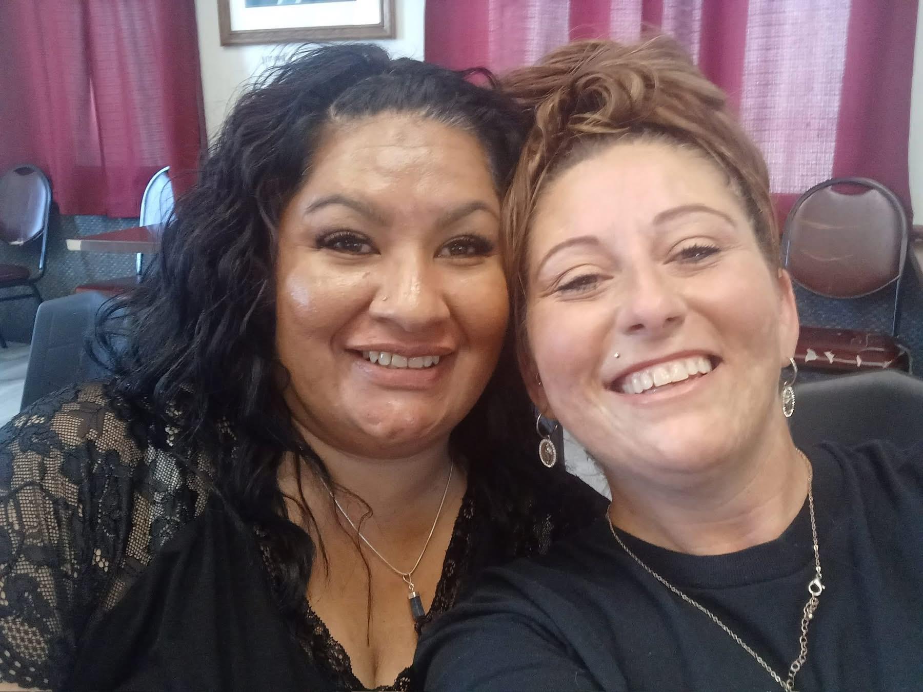 Two women taking a selfie