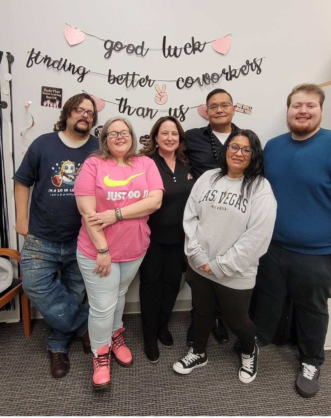 A group of people posing for a photo