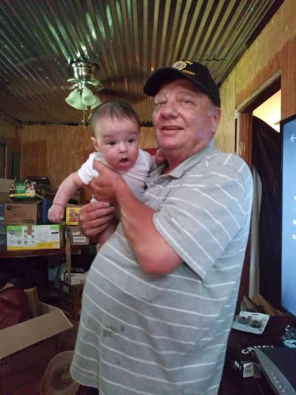 A man holding a baby