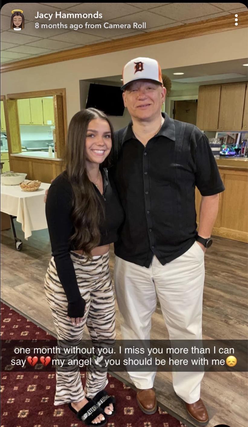 A man and woman posing for a picture