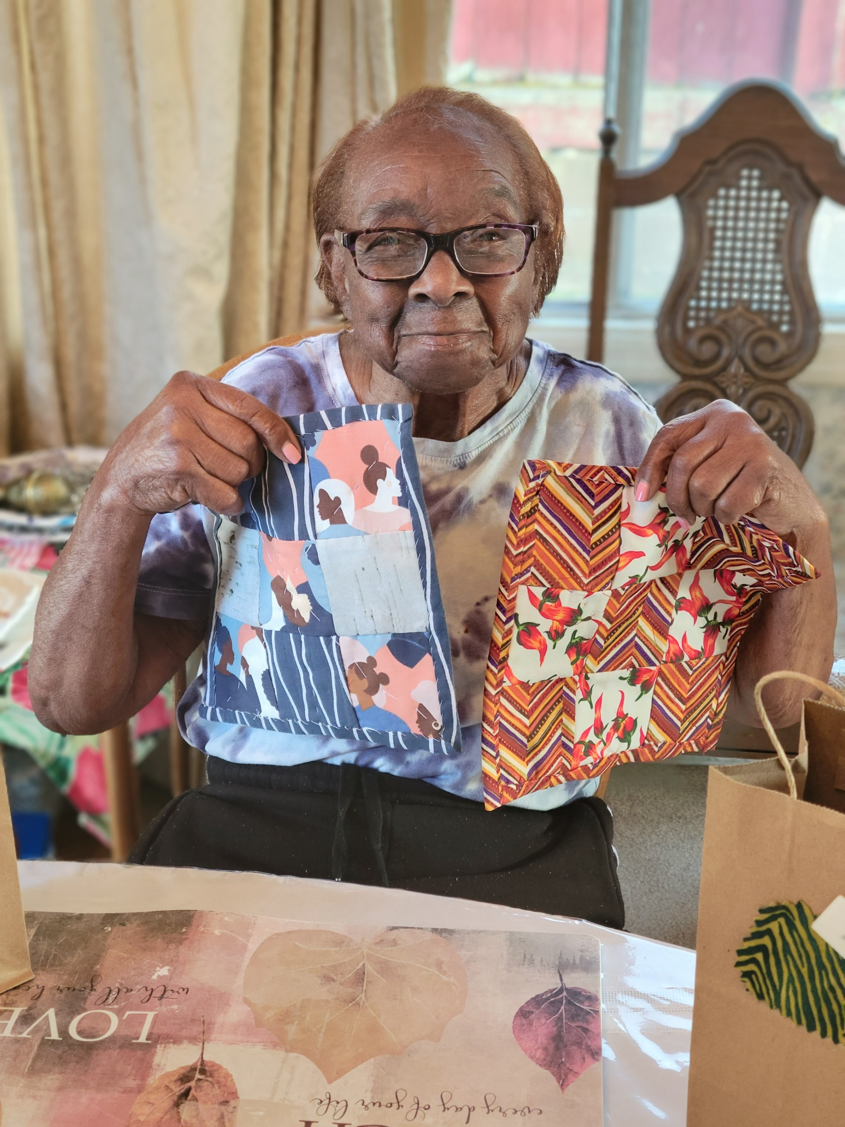 An old woman holding a bag