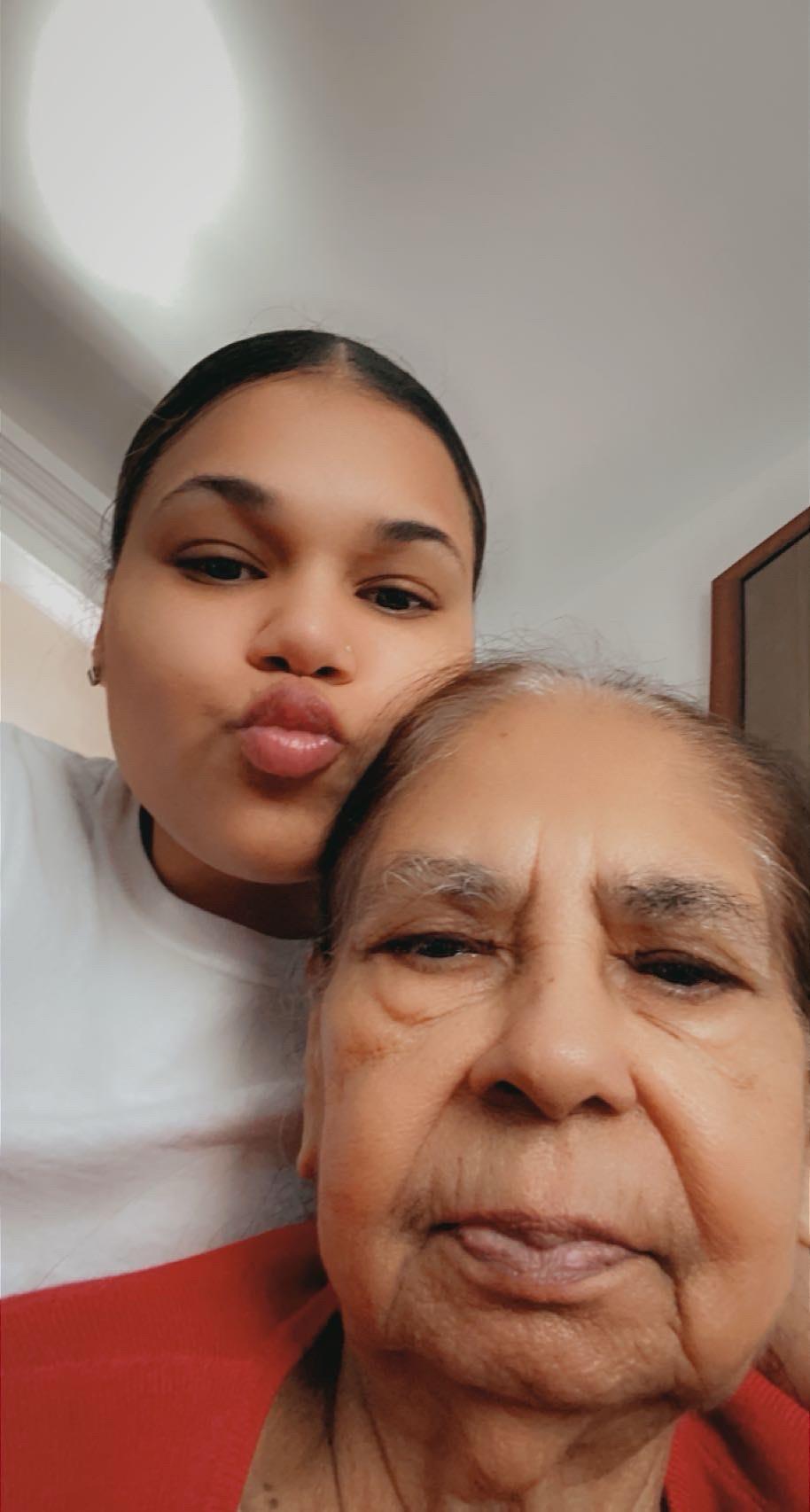 A woman and a girl taking a selfie