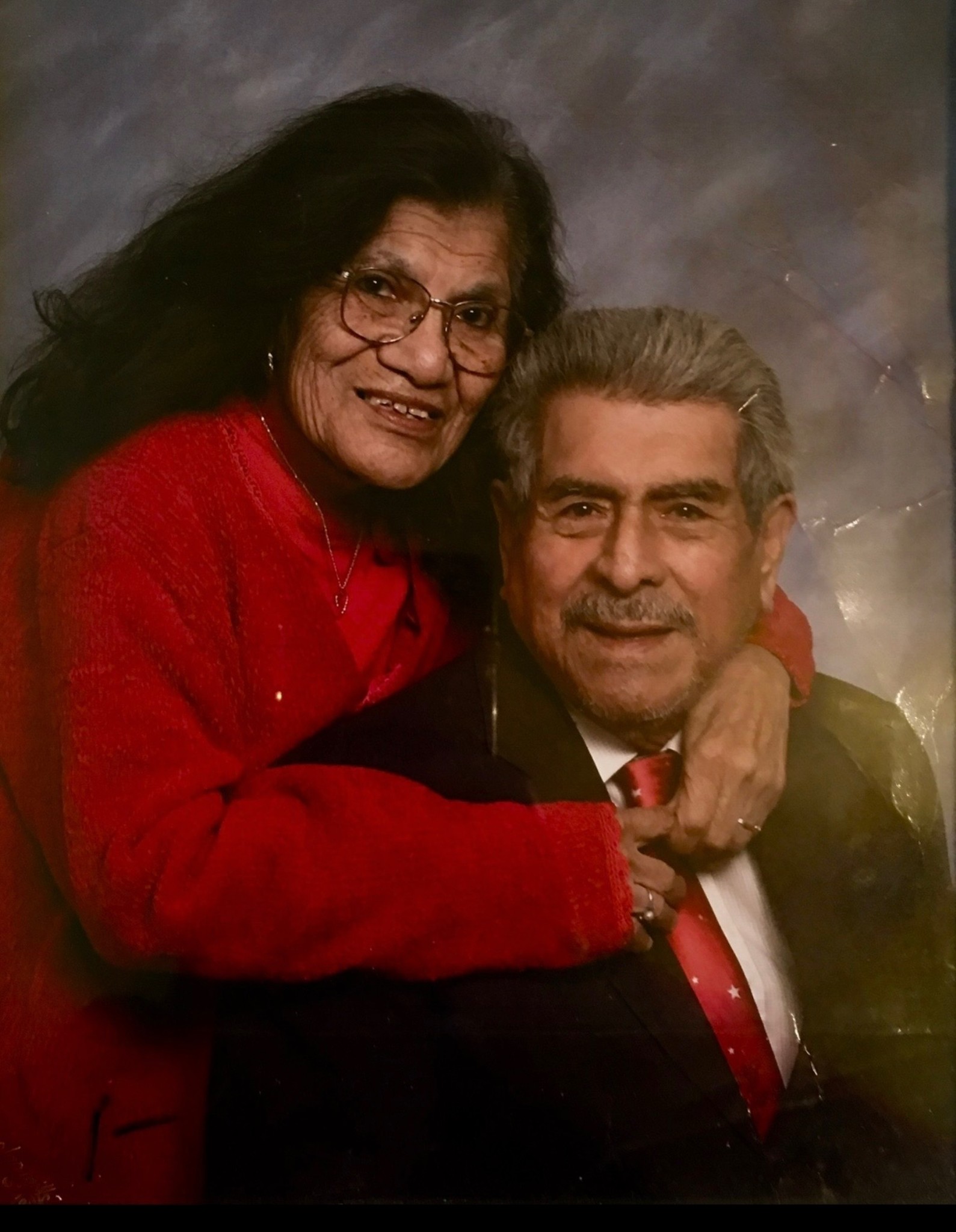 A man and woman posing for a picture