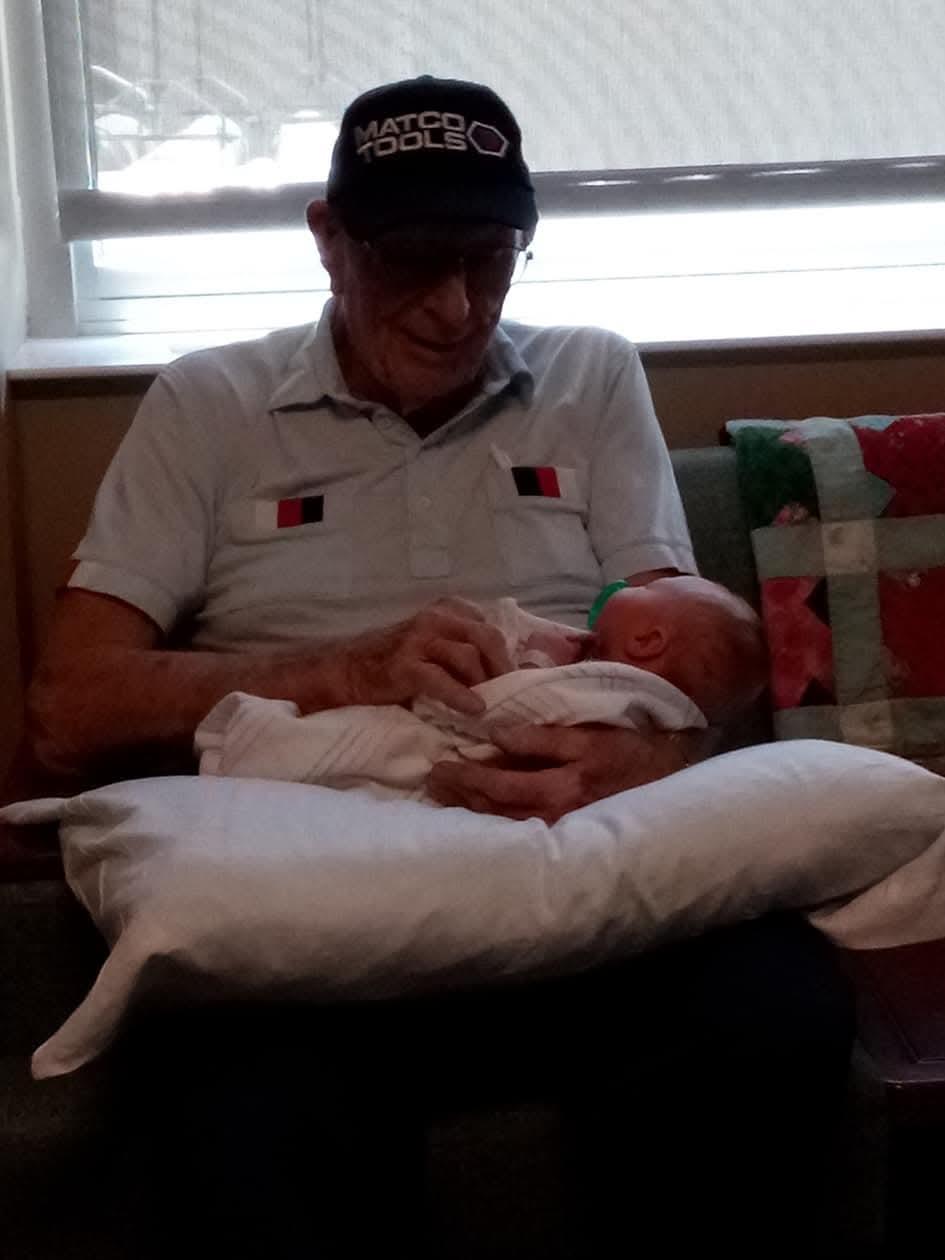 A man holding a baby