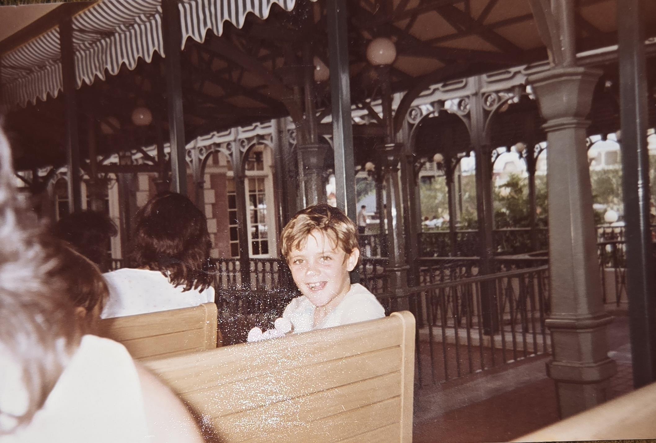 A boy sitting in a chair