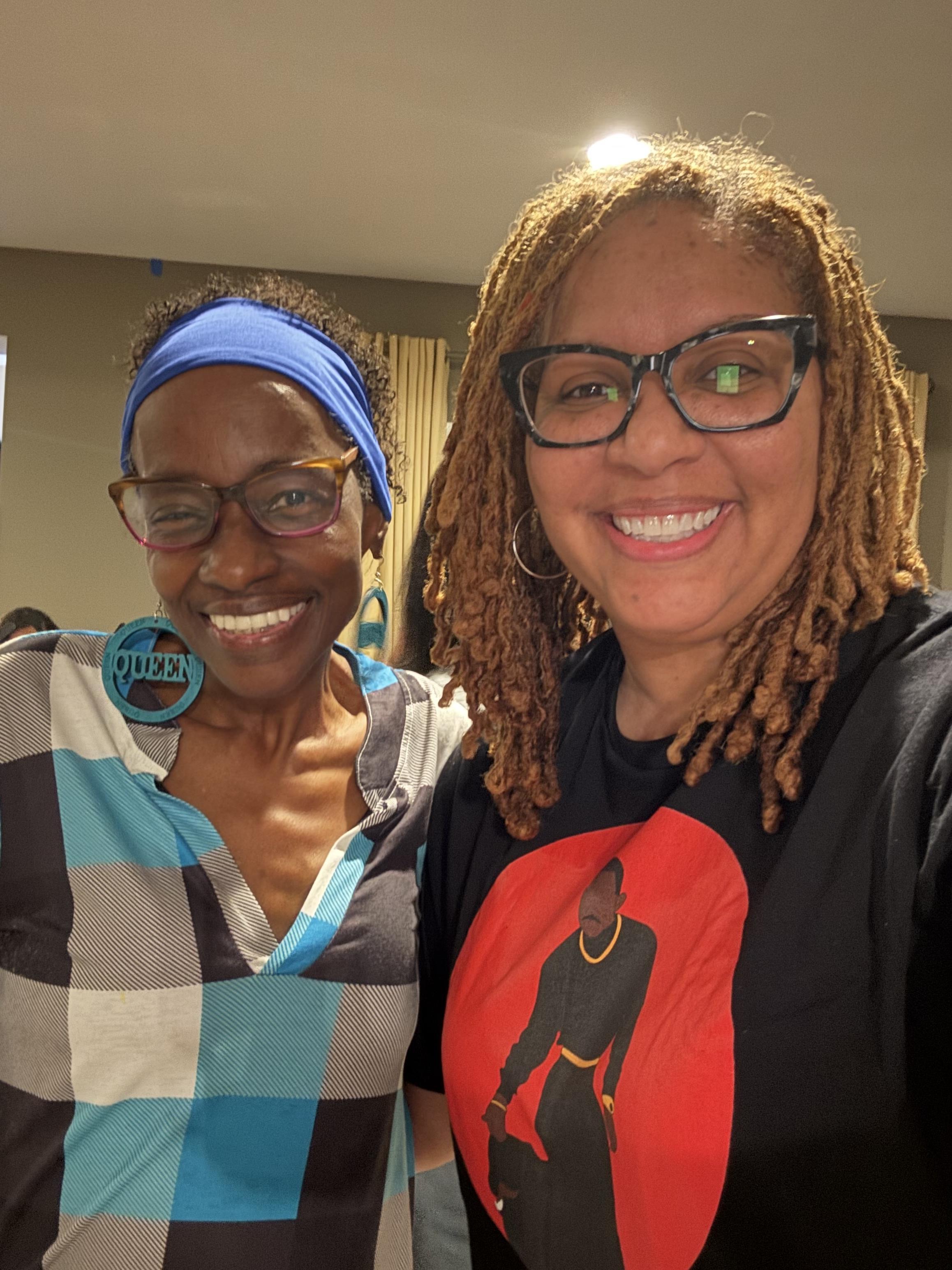 Two women smiling at the camera