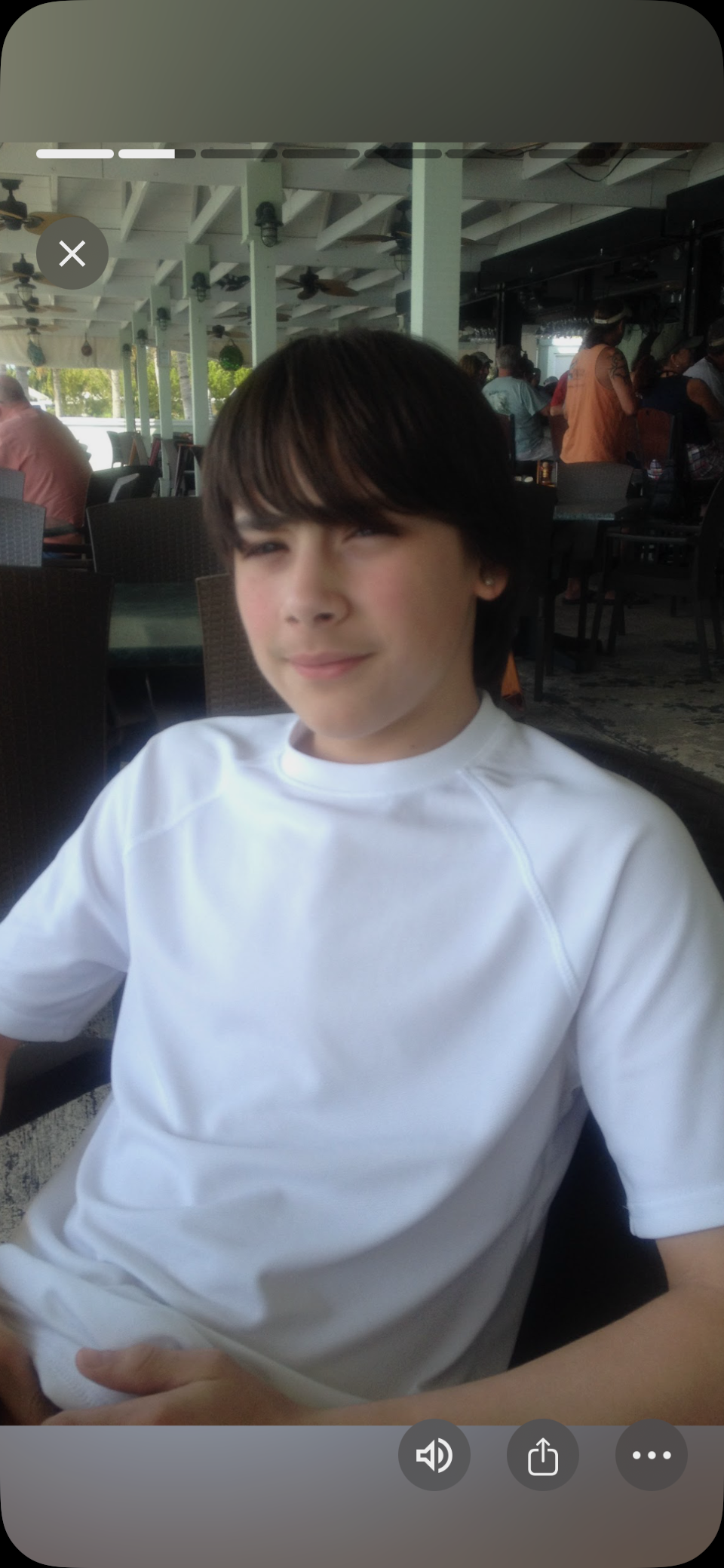 A boy in a white shirt