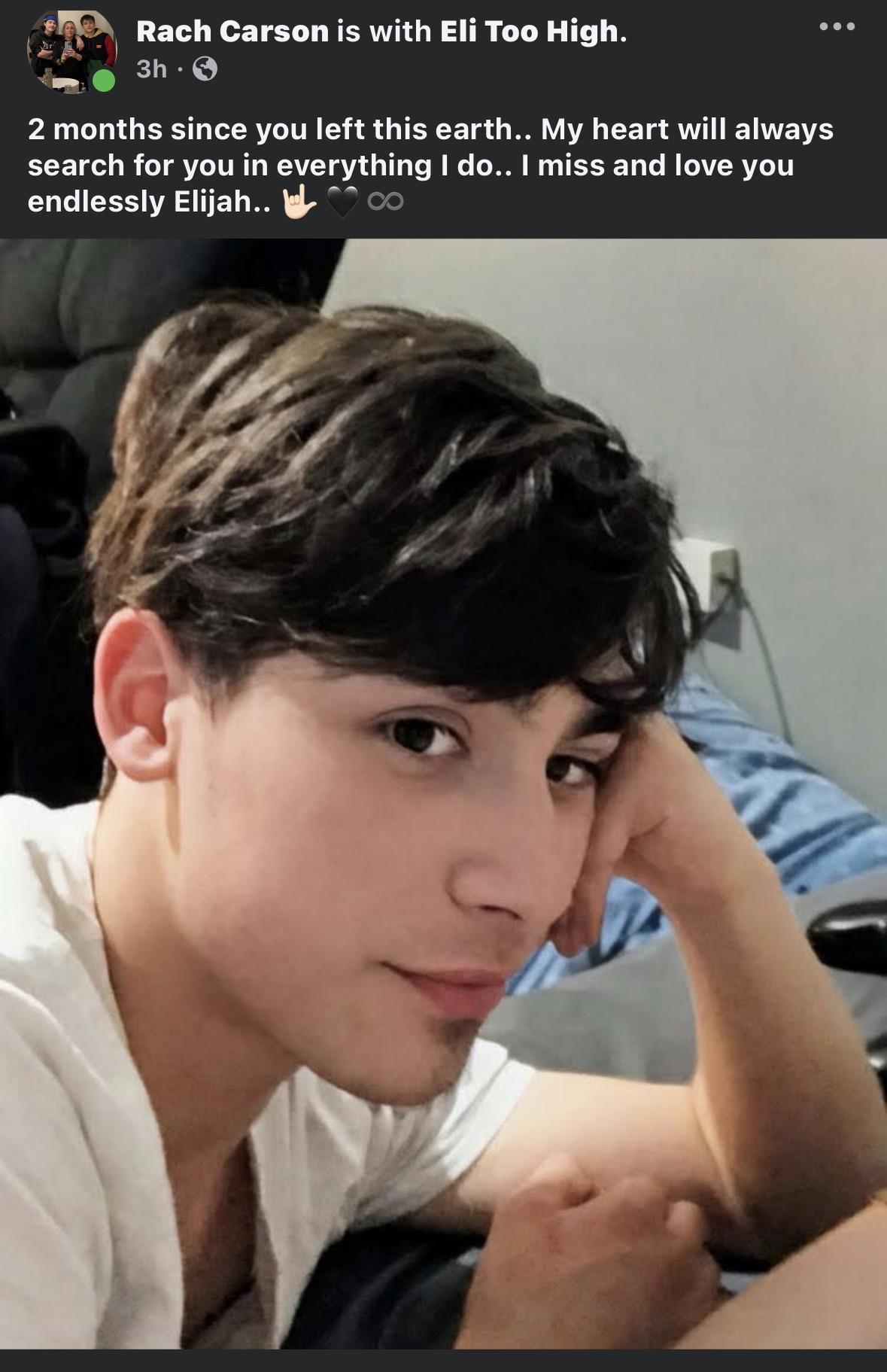 A man with his hand on his head