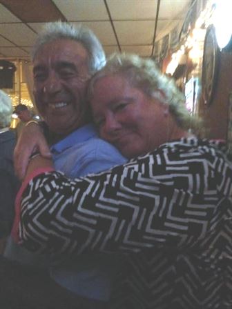 A man and woman hugging