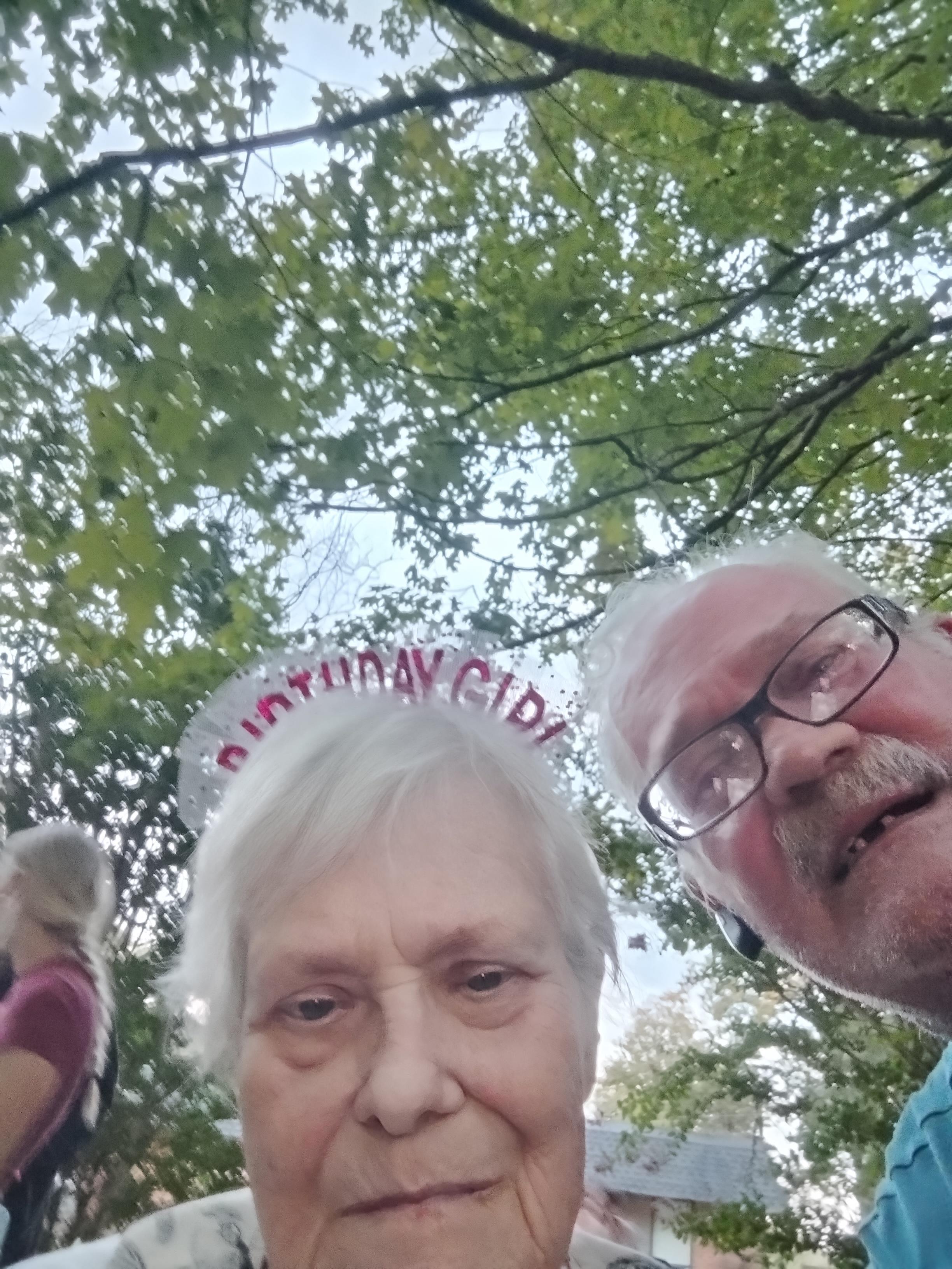 A man and woman taking a selfie