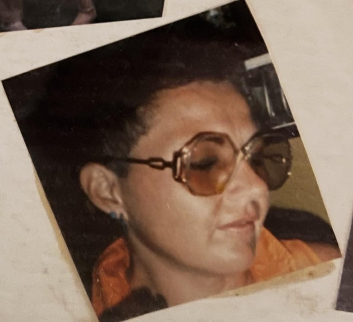 A woman wearing sunglasses