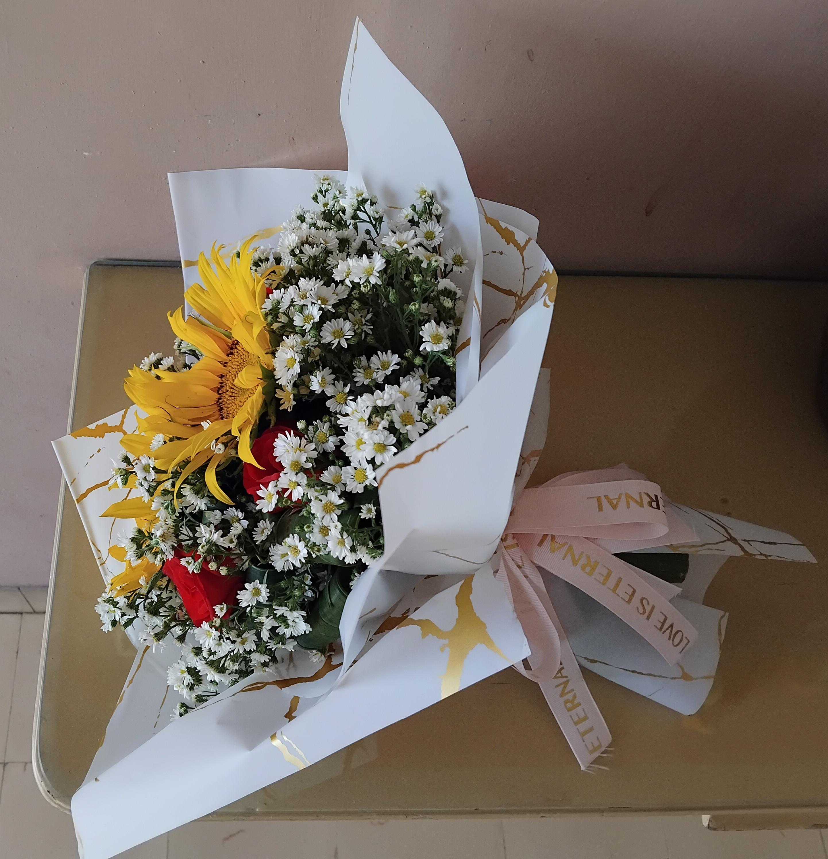 A bouquet of flowers on a table