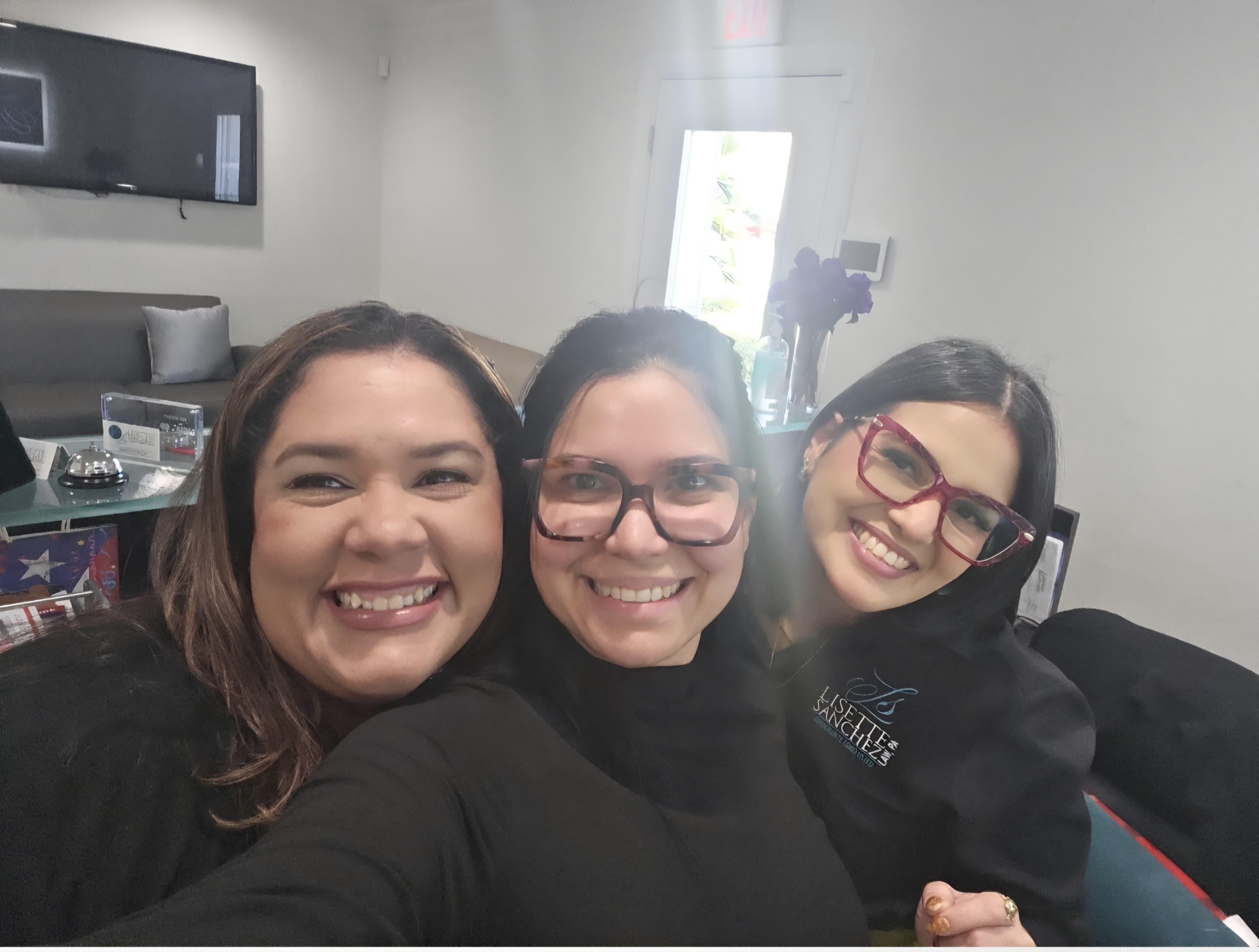 A group of women smiling for a selfie