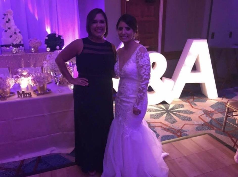 Two women standing next to each other