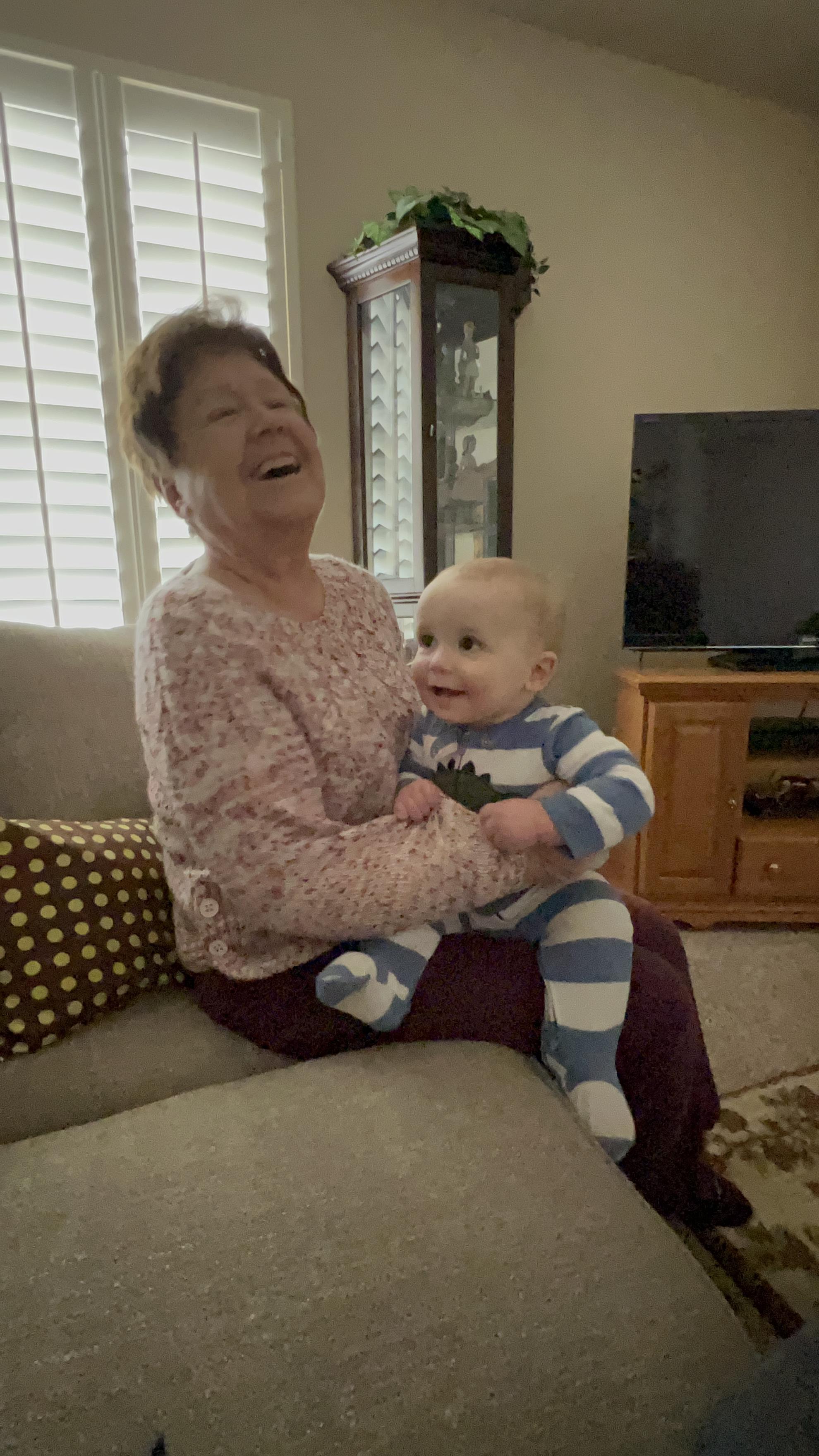 A woman holding a baby