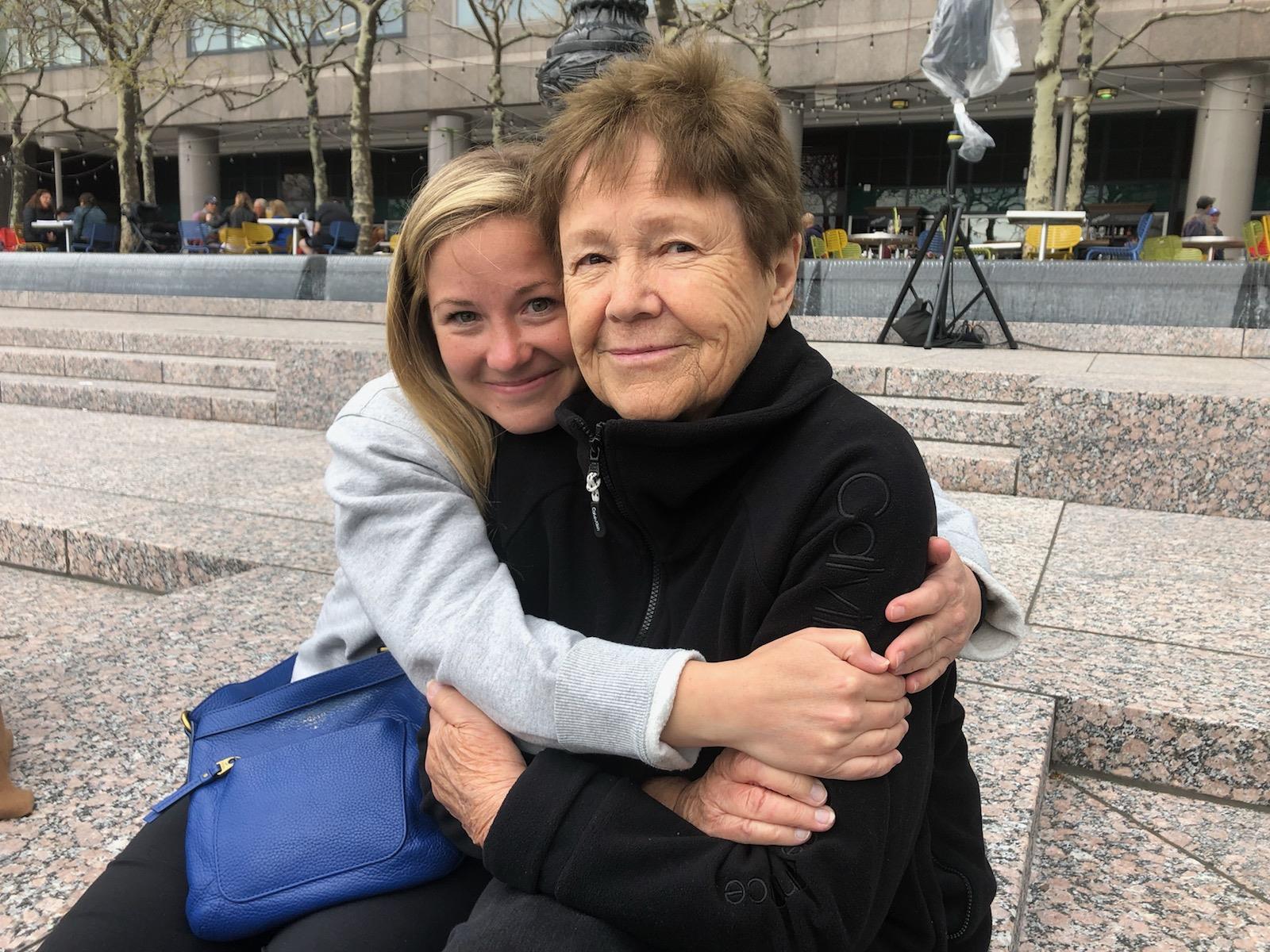 A woman hugging another woman