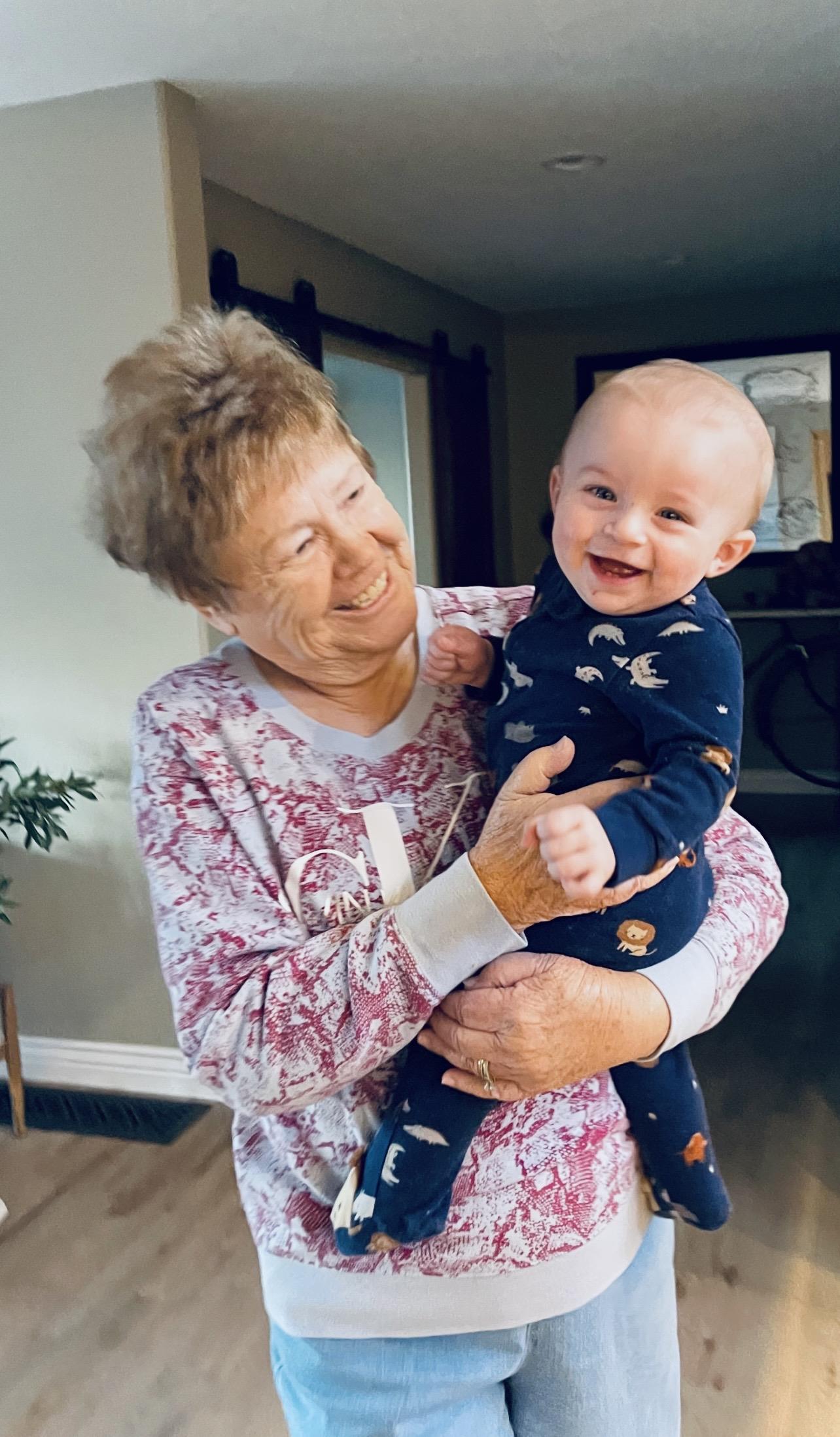 A woman holding a baby
