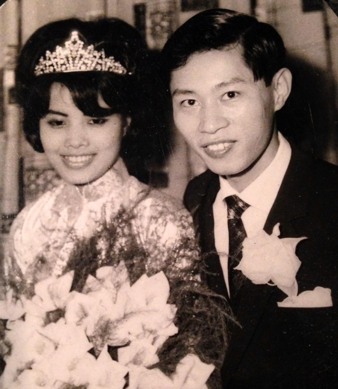 A man and woman posing for a picture