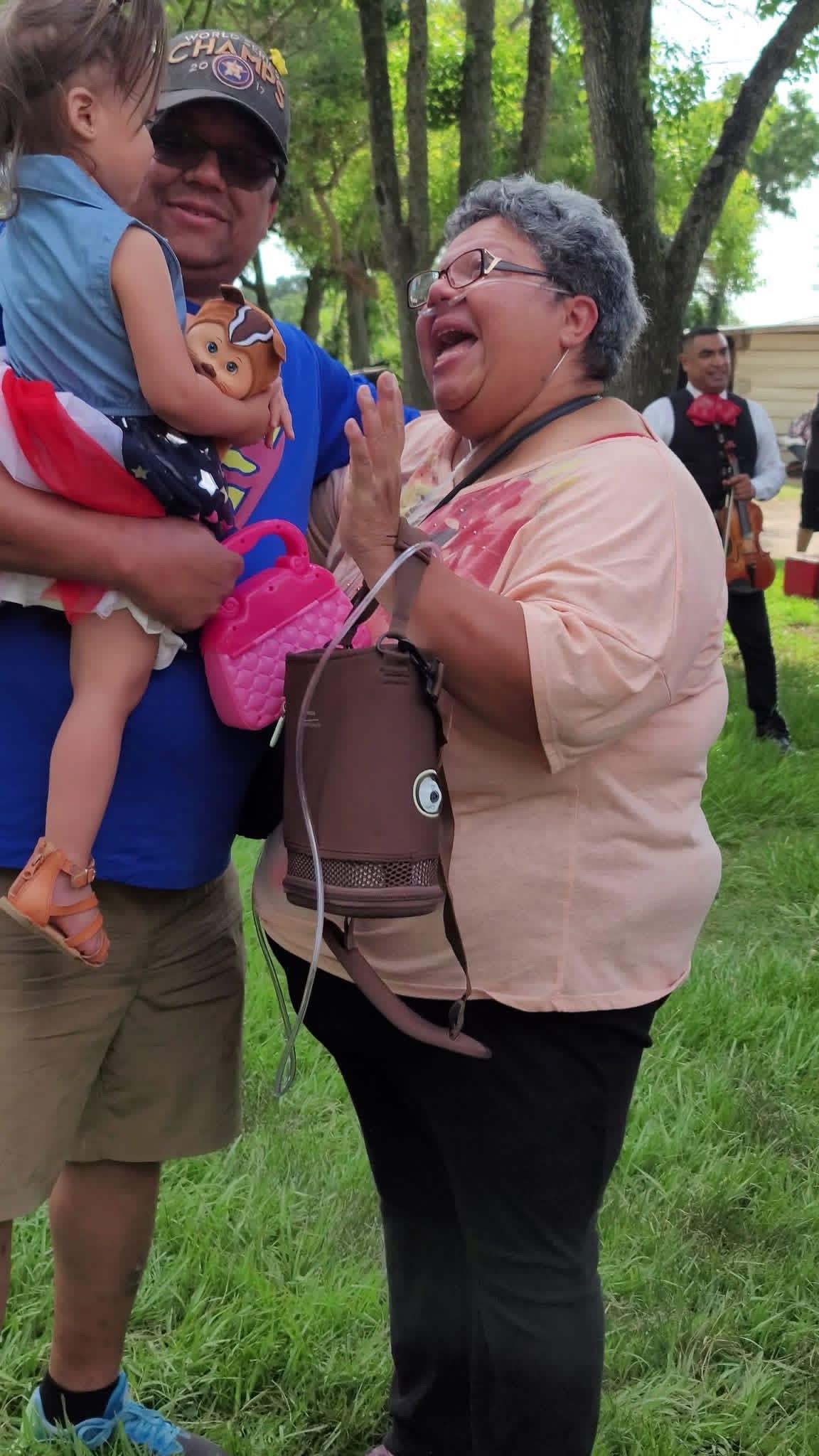 A woman holding a baby