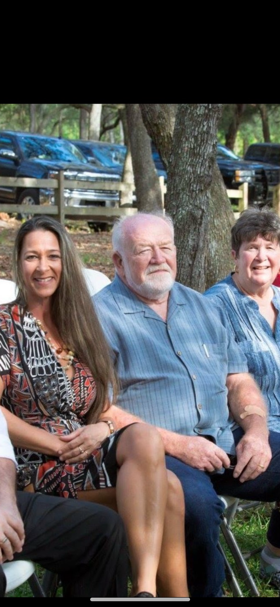 A group of people sitting on a bench