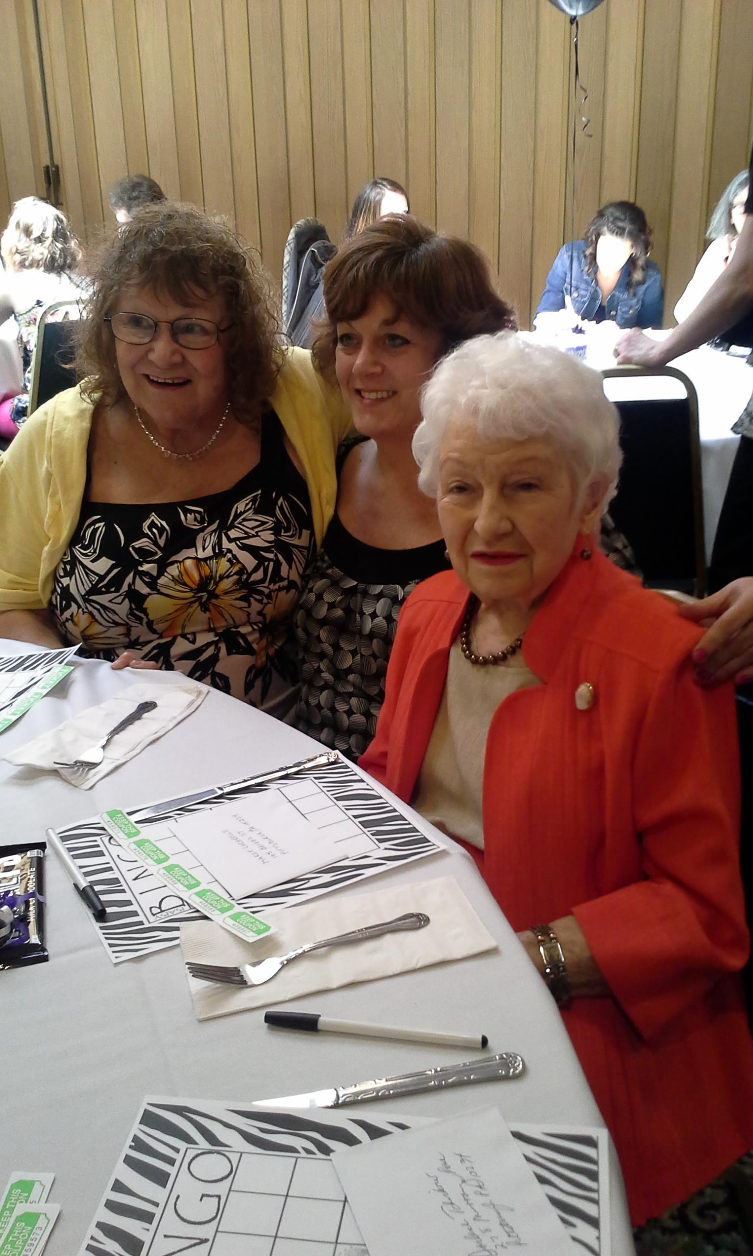 A group of women sitting at a table