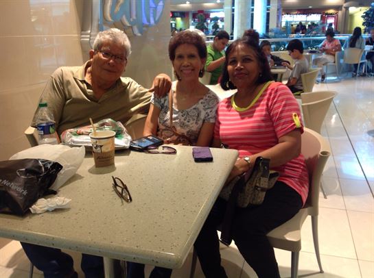 A group of people sitting at a table