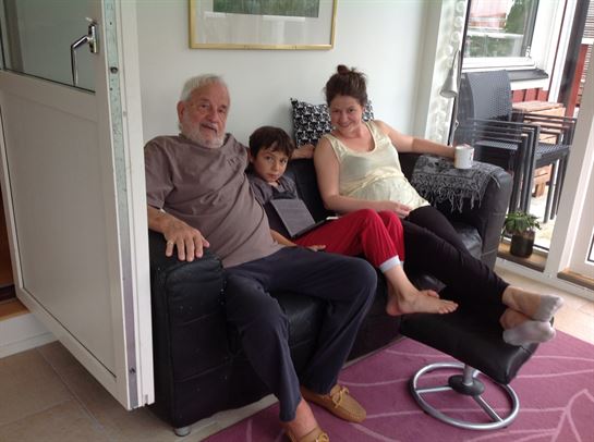 A group of people sitting on a couch